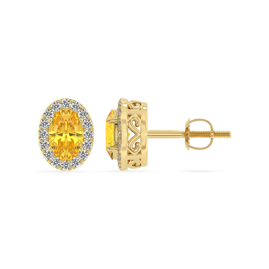 lab grown yellow sapphire oval stud earrings in yellow gold
