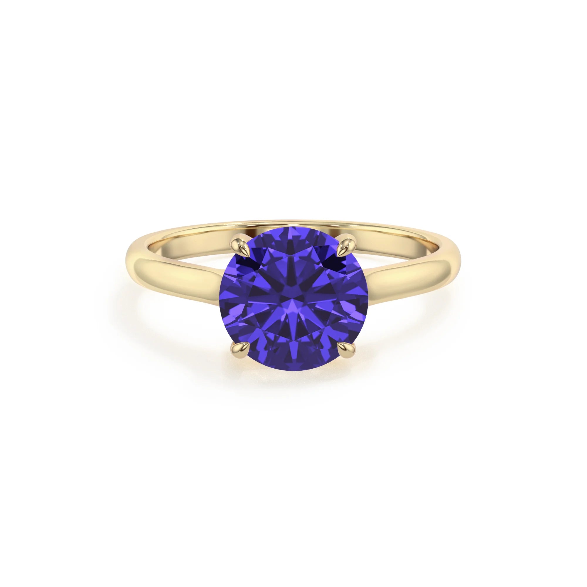 lab grown tanzanite round solitaire rings in yellow gold