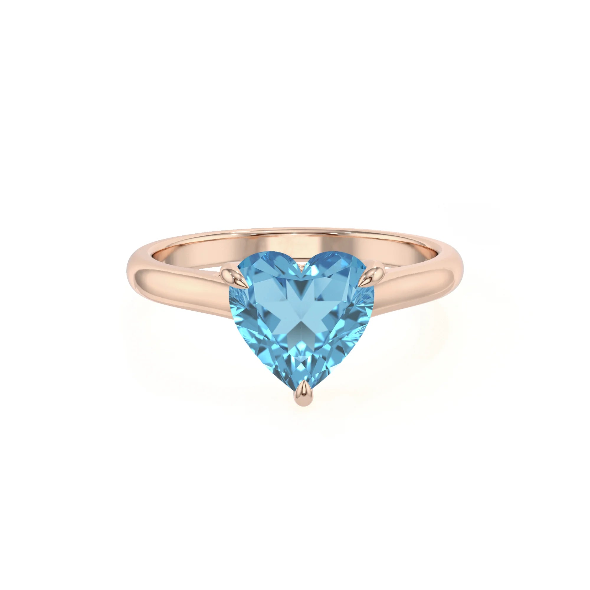 natural swiss-blue-topaz heart solitaire rings in rose gold