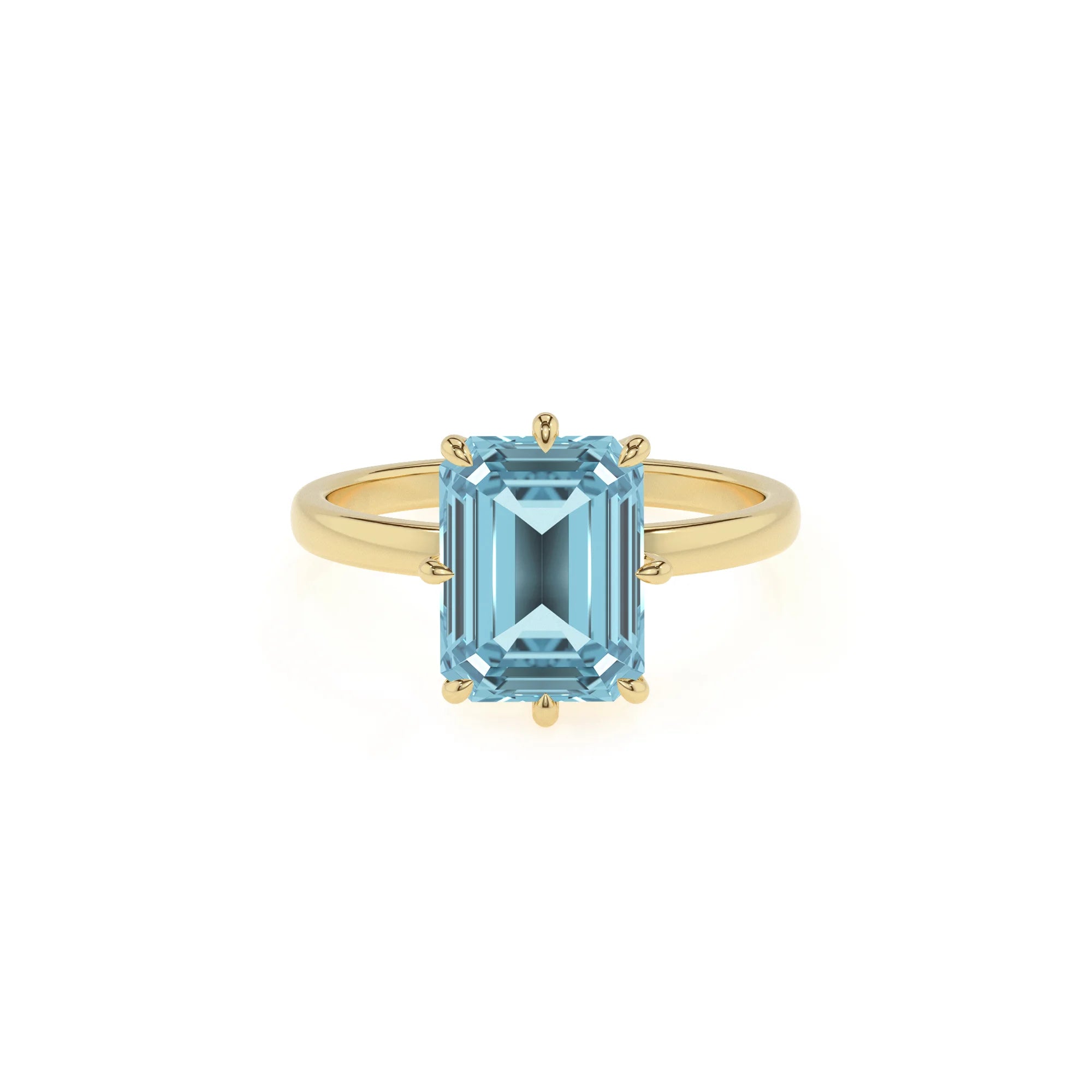lab grown aquamarine emerald cut solitaire rings in yellow gold