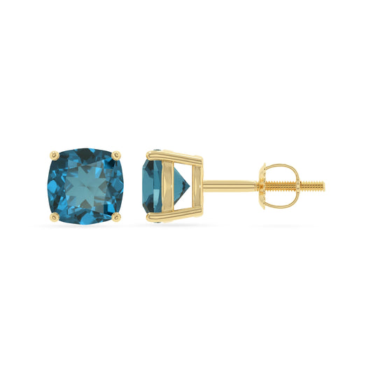 natural london blue topaz cushion stud earrings in yellow gold