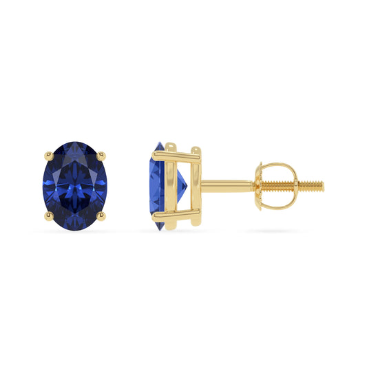 lab grown blue sapphire oval stud earrings in yellow gold