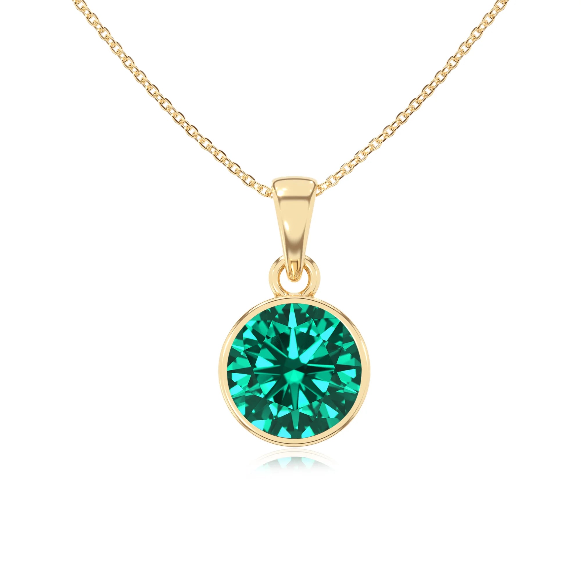 lab grown emerald round solitaire necklaces in yellow gold