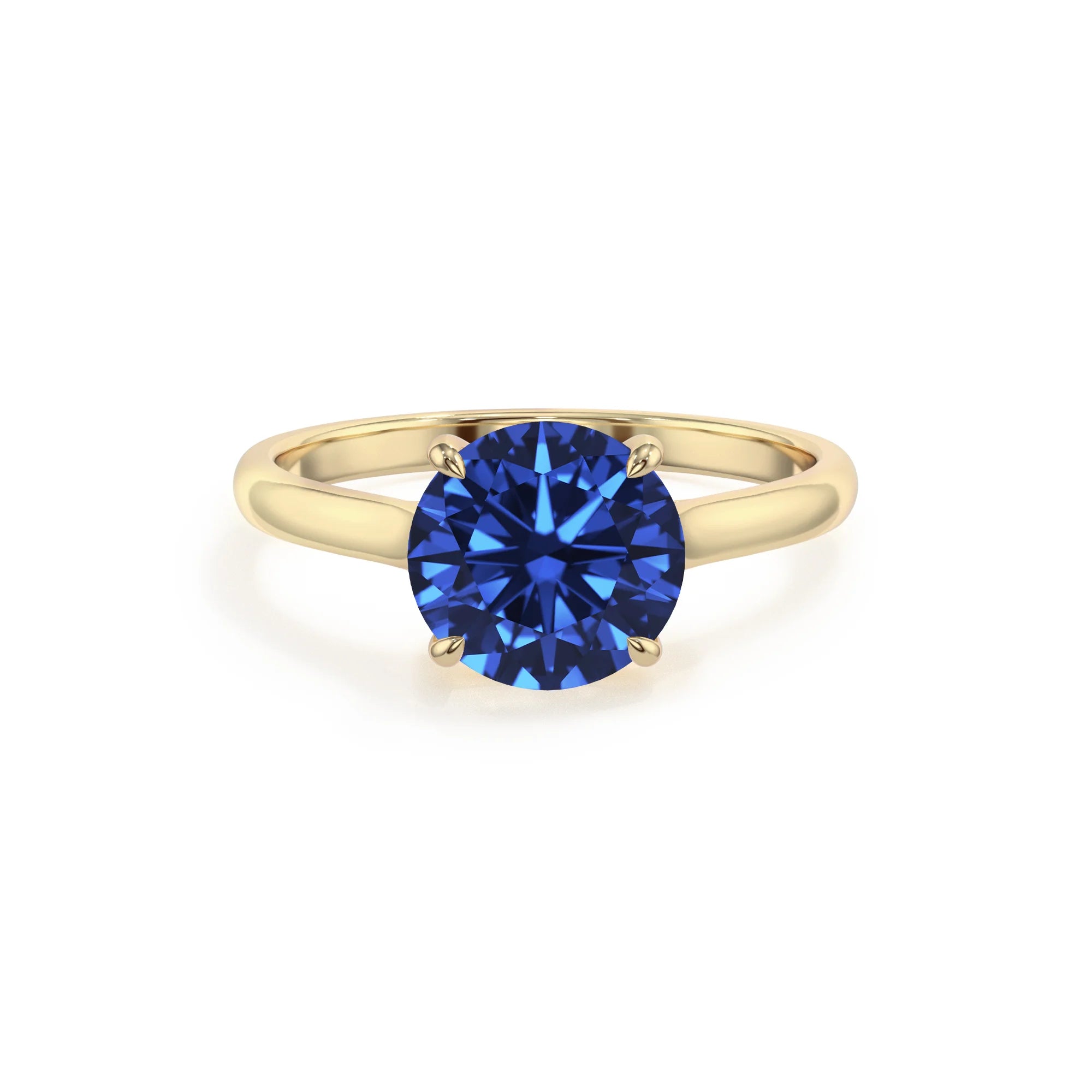 lab grown blue-sapphire round solitaire rings in yellow gold