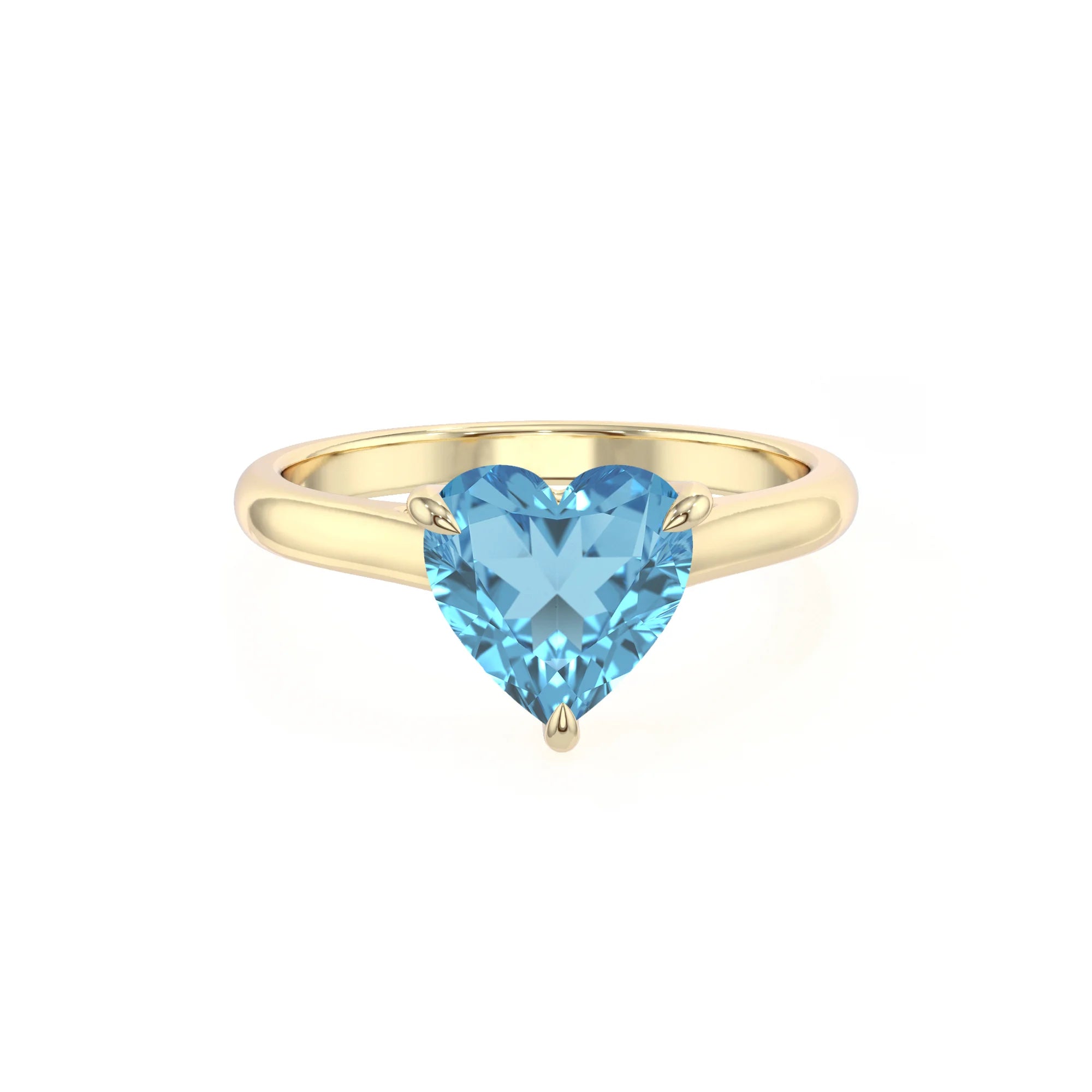 natural swiss-blue-topaz heart solitaire rings in yellow gold