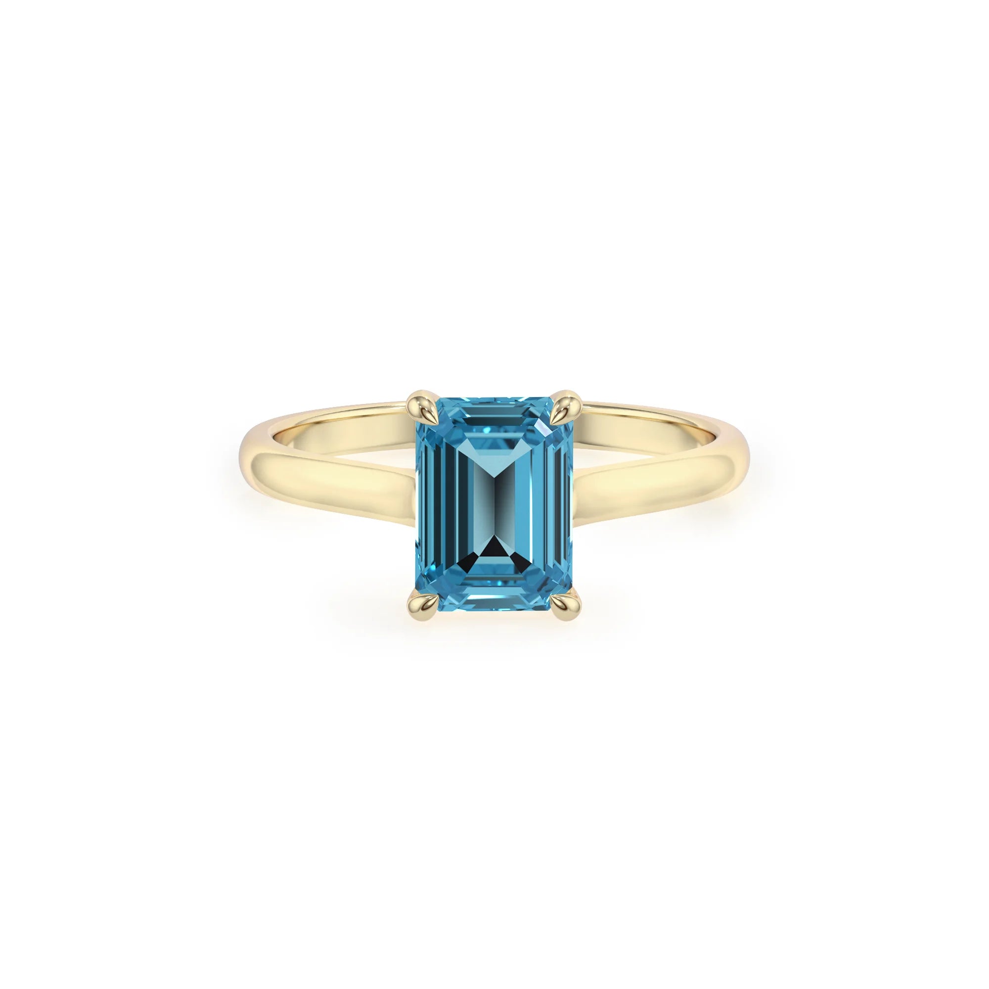 natural swiss-blue-topaz emerald cut solitaire rings in yellow gold