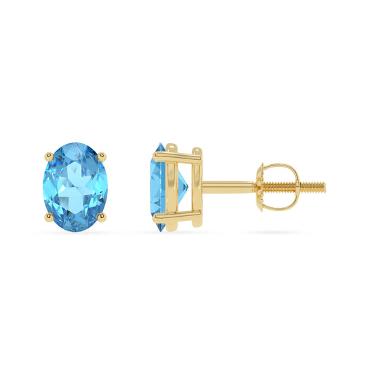 natural swiss blue topaz oval stud earrings in yellow gold