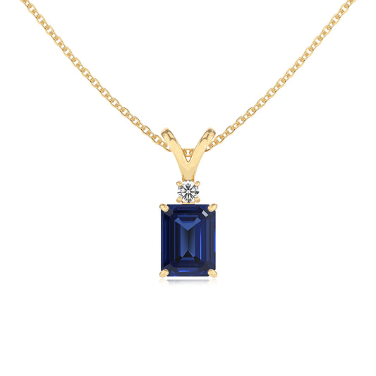 lab grown blue-sapphire emerald cut solitaire v-bale necklaces in yellow gold