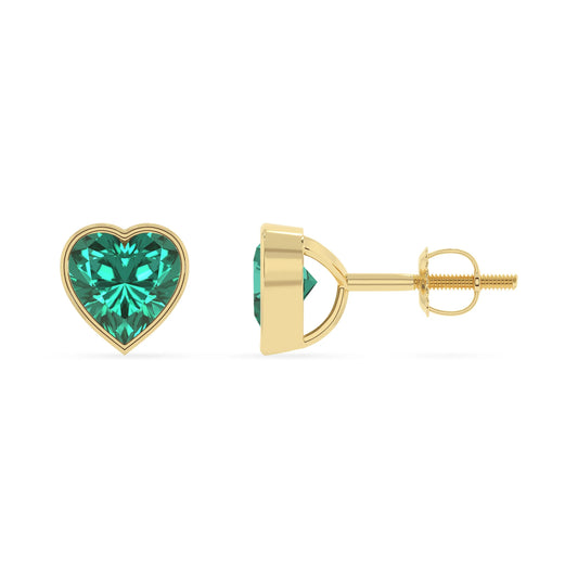 lab grown emerald heart stud earrings in yellow gold