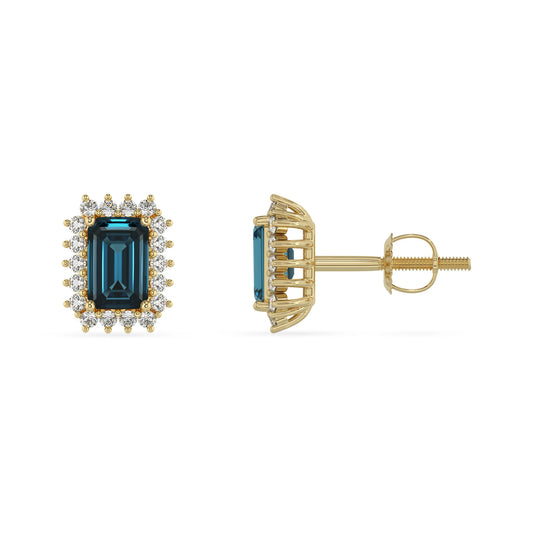 natural london blue topaz emerald cut stud earrings in yellow gold