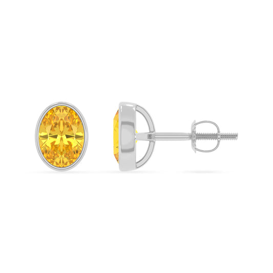 lab grown yellow sapphire oval stud earrings in white gold