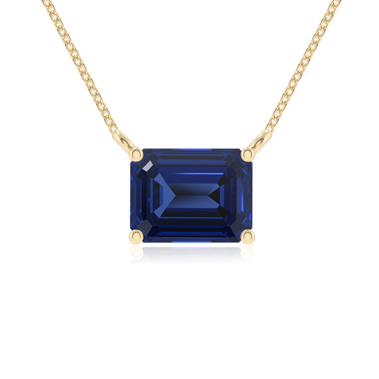 lab grown blue-sapphire emerald cut solitaire necklaces in yellow gold