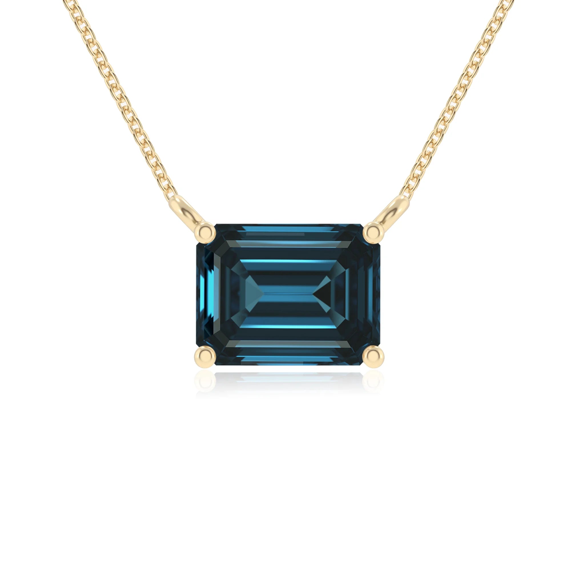 natural london-blue-topaz emerald cut solitaire necklaces in yellow gold