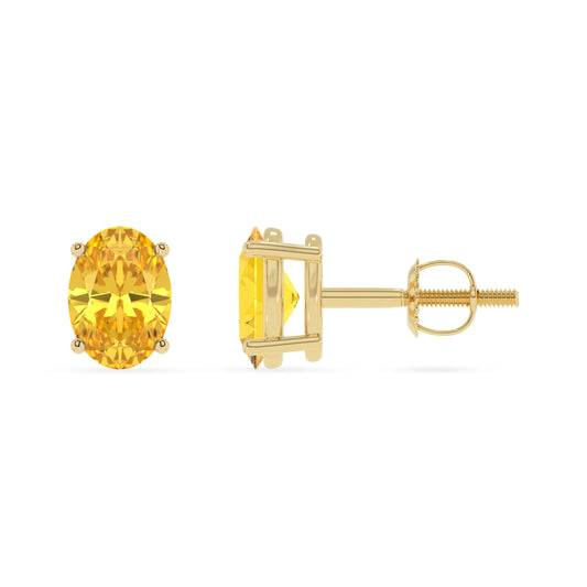 lab grown yellow sapphire oval stud earrings in yellow gold