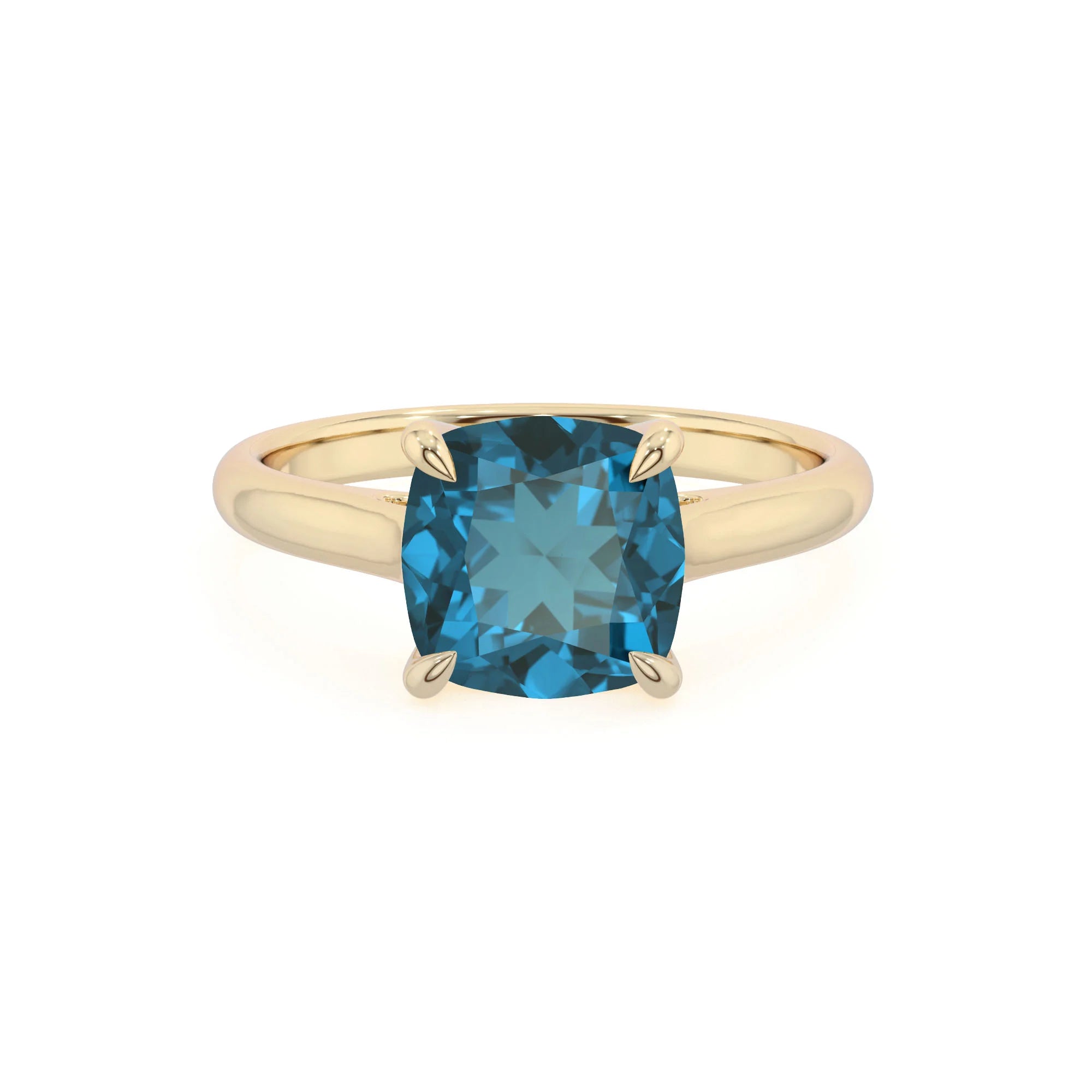 natural london-blue-topaz cushion solitaire rings in yellow gold