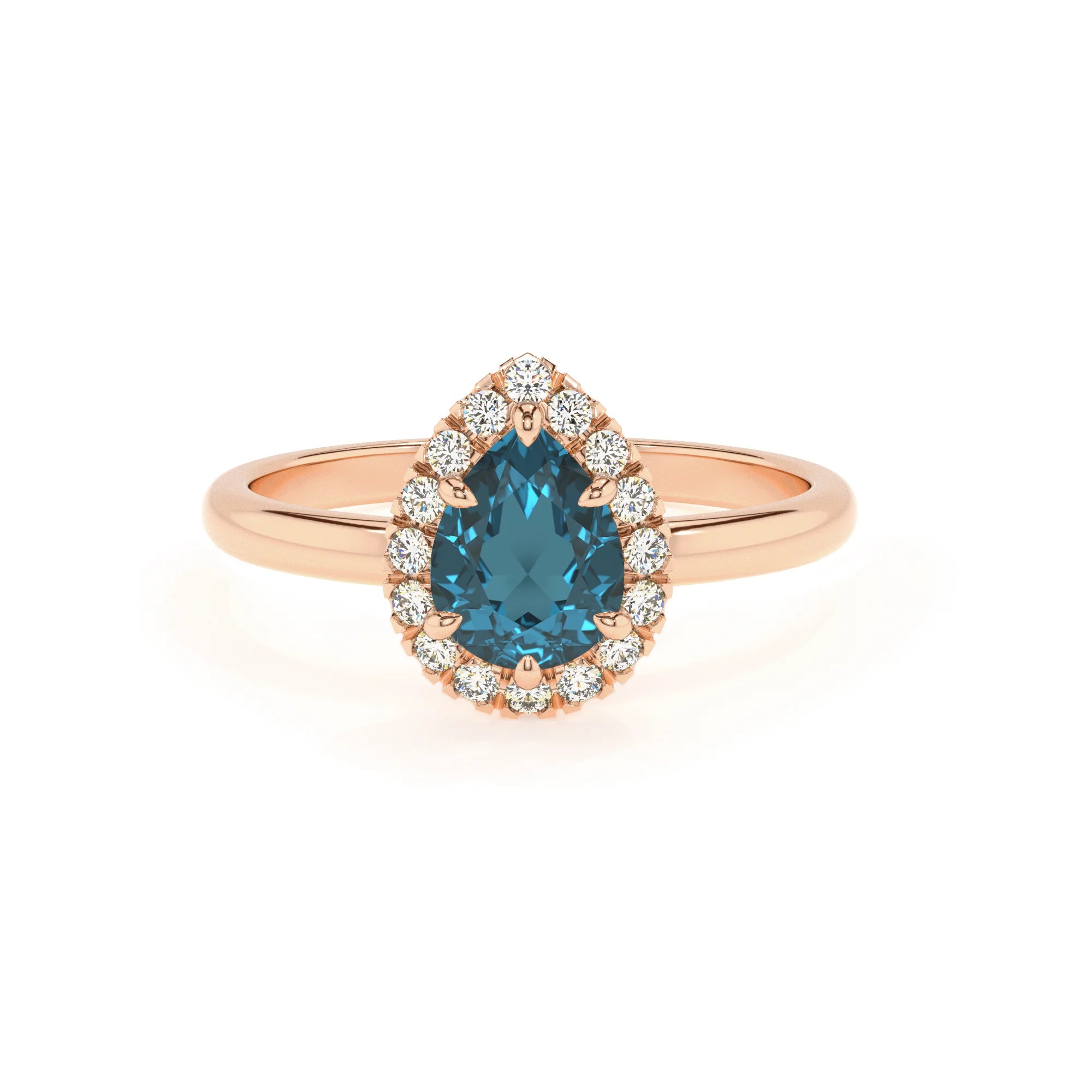 natural london-blue-topaz pear solitaire rings in rose gold