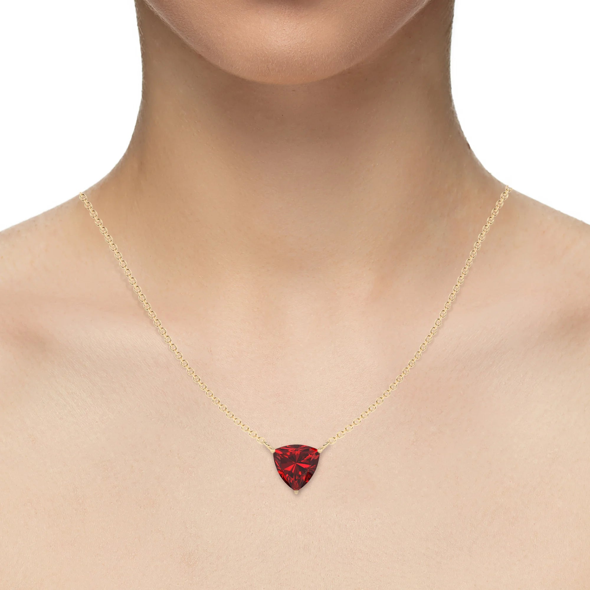 lab grown ruby trillion solitaire necklaces in yellow gold