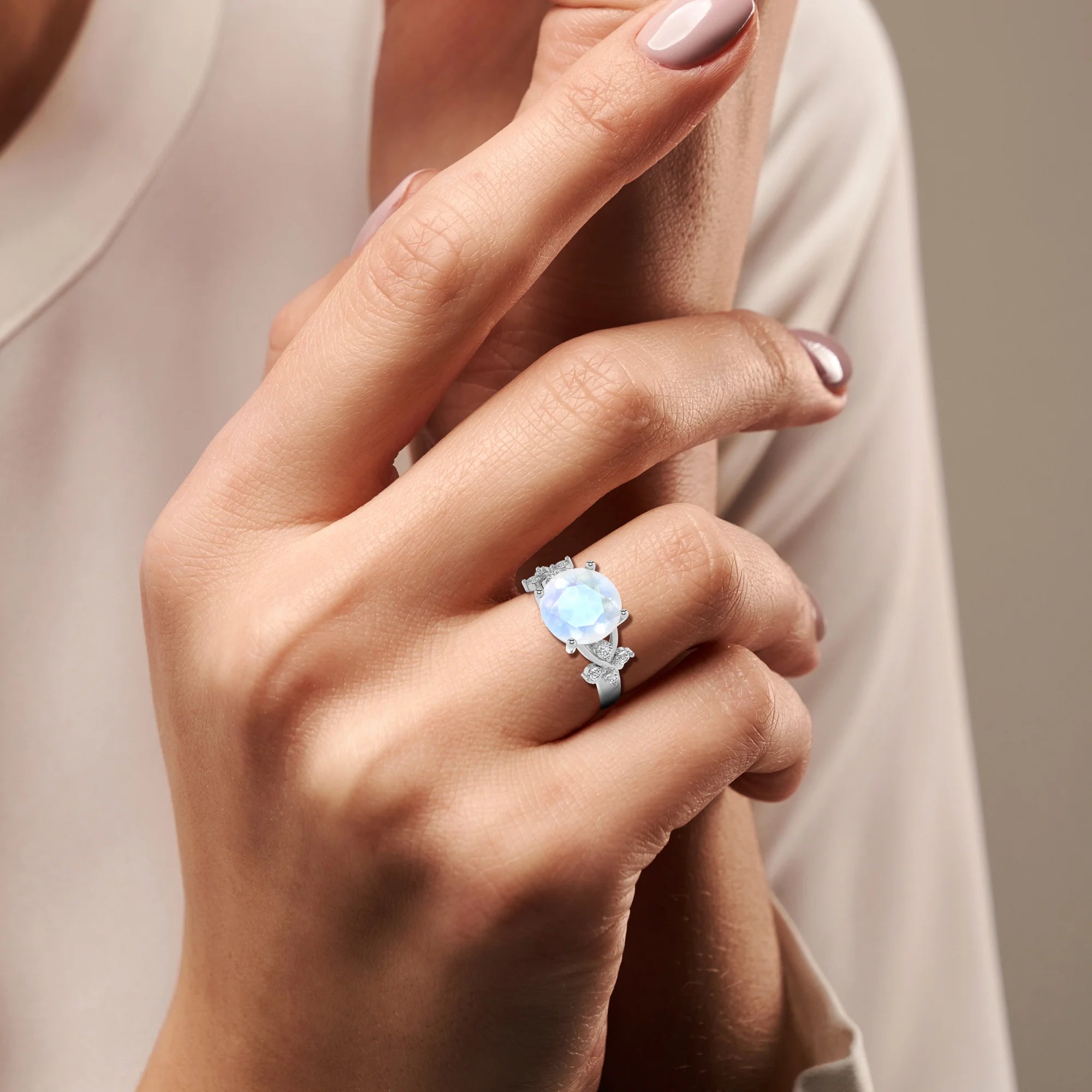 natural rainbow-moonstone round solitaire rings in white gold