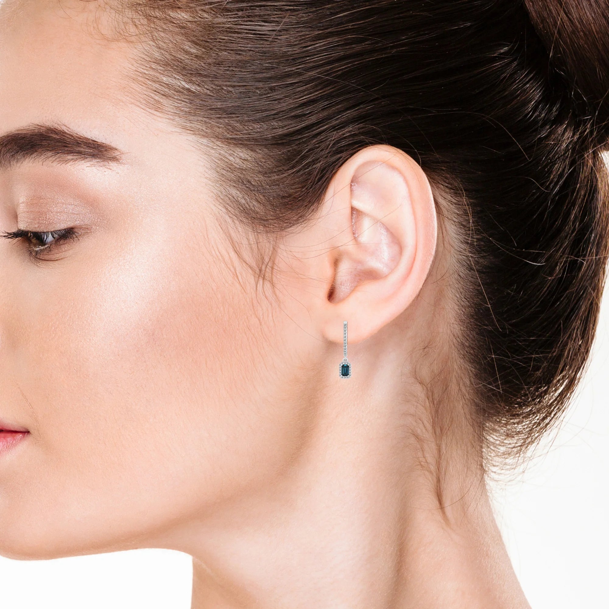 natural london blue topaz emerald cut drop earrings in platinum