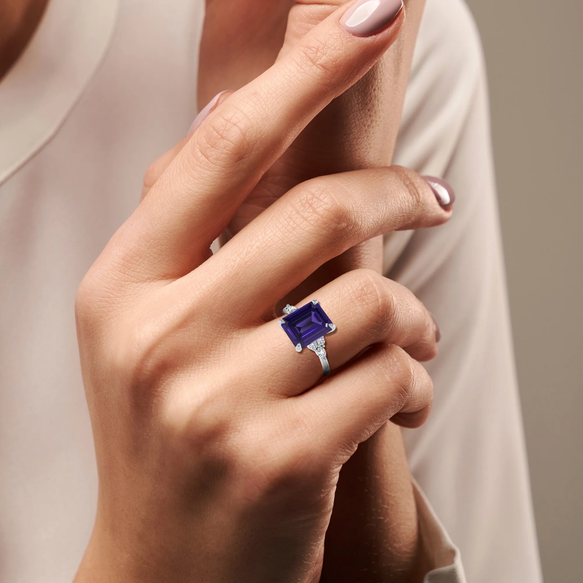 lab grown tanzanite emerald cut solitaire rings in platinum