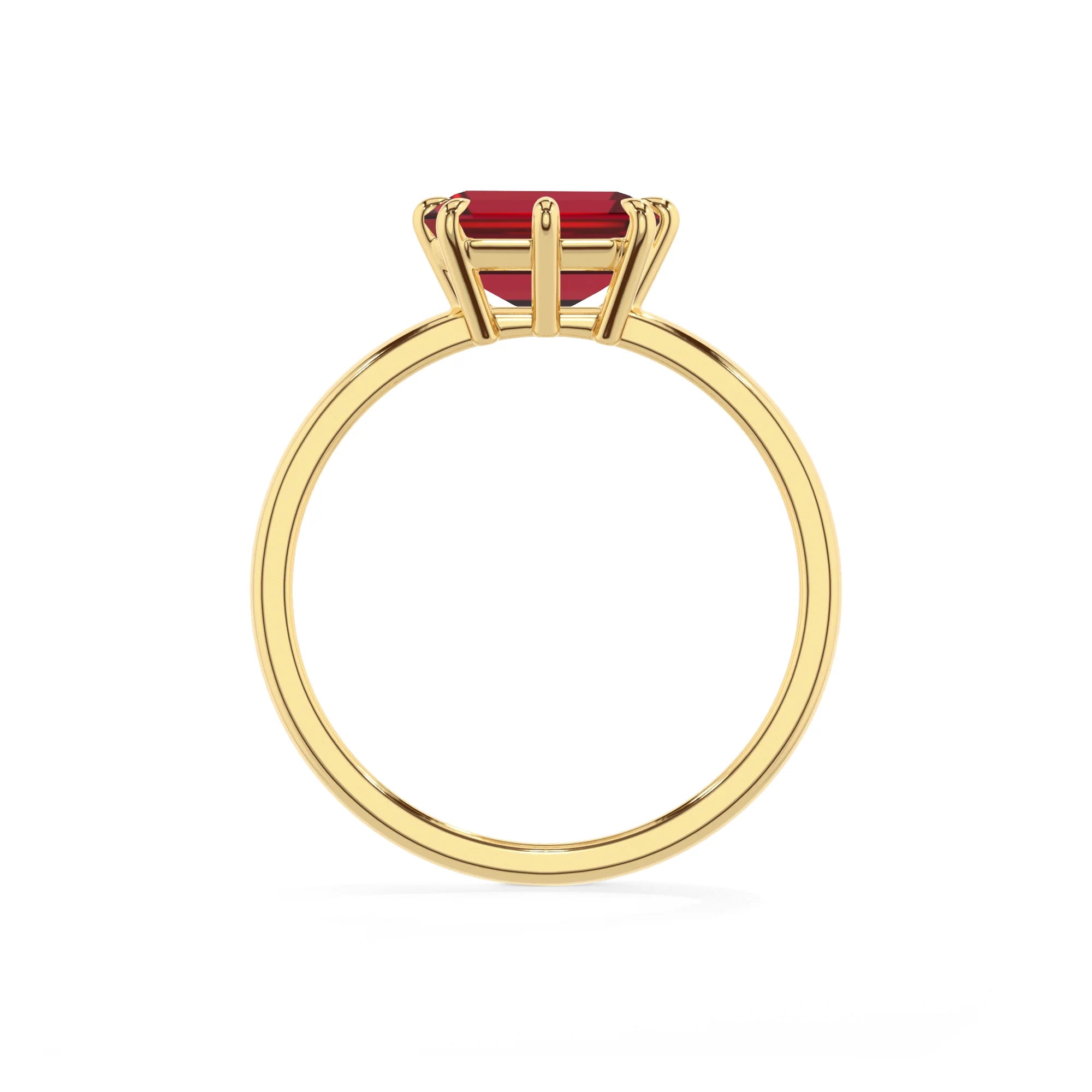 lab grown ruby emerald cut solitaire rings in yellow gold