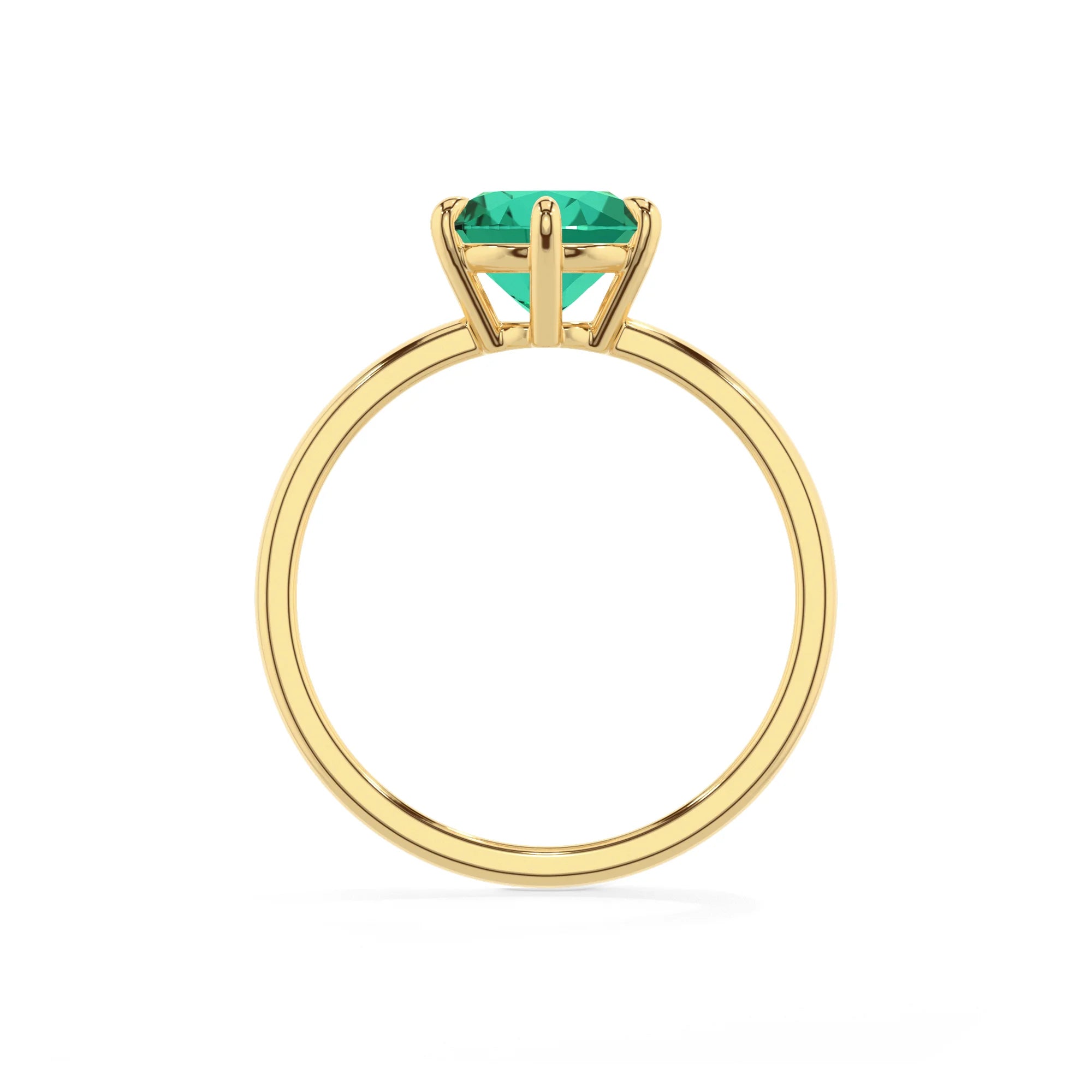 lab grown emerald round solitaire rings in yellow gold