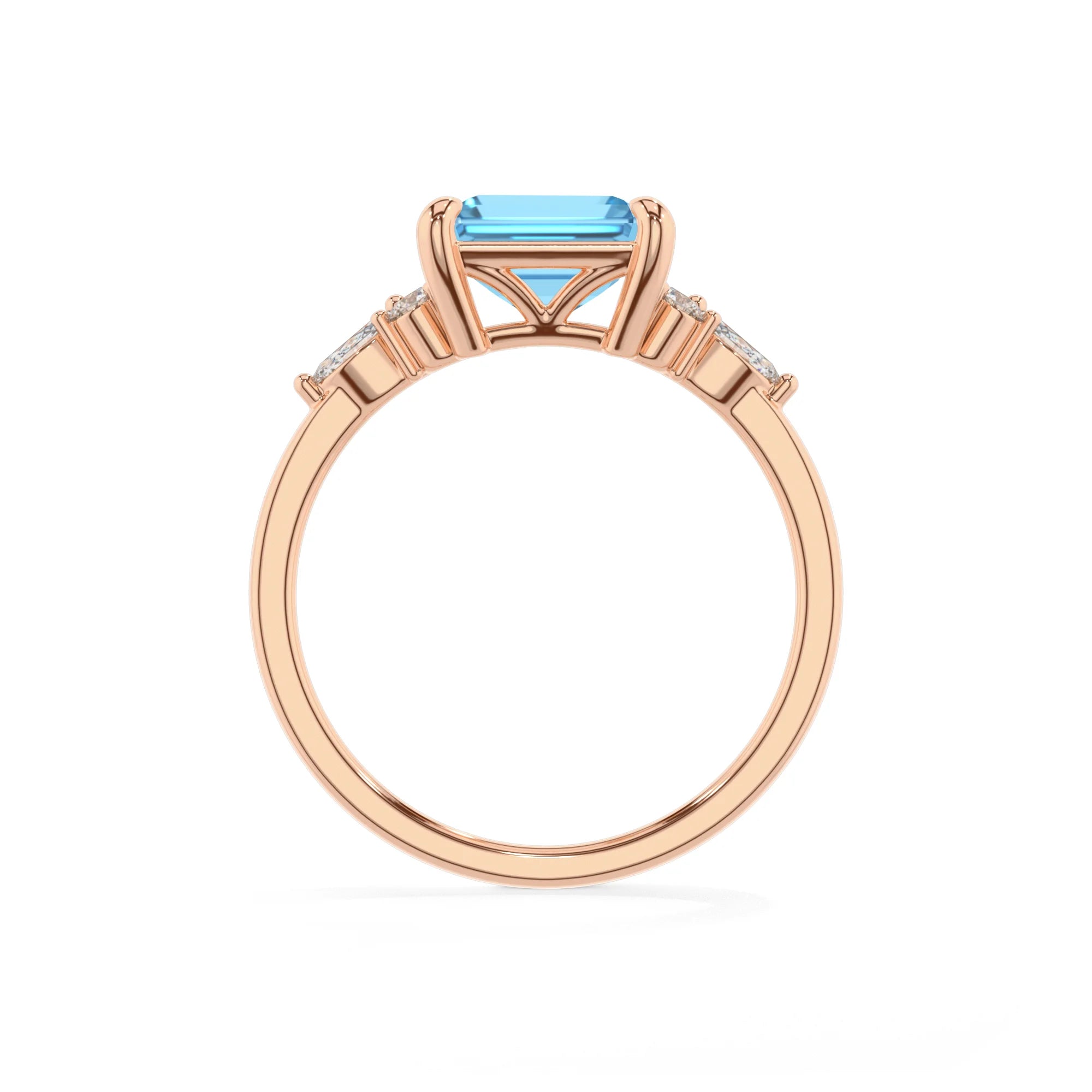 natural swiss-blue-topaz emerald cut solitaire rings in rose gold