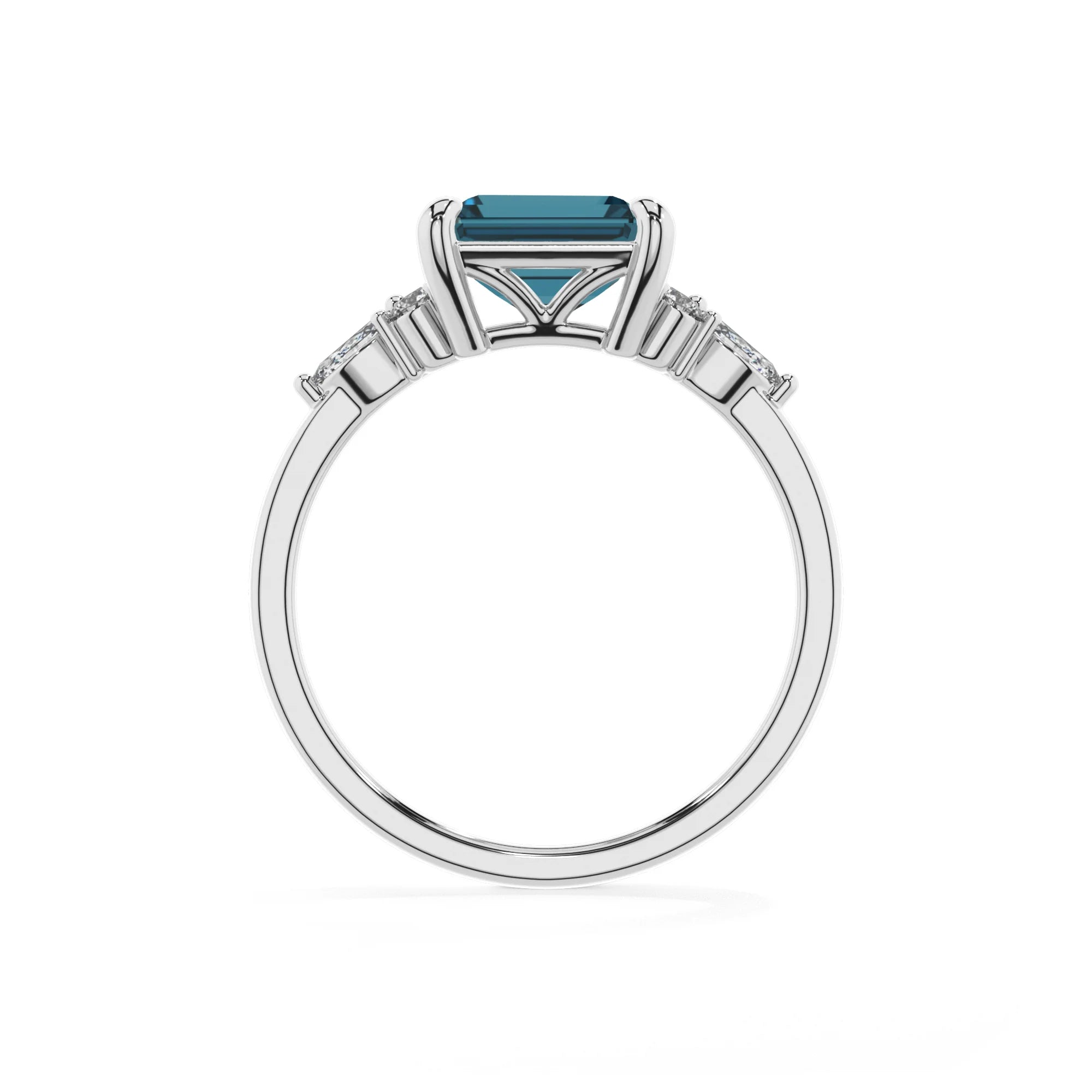 natural london-blue-topaz emerald cut solitaire rings in platinum