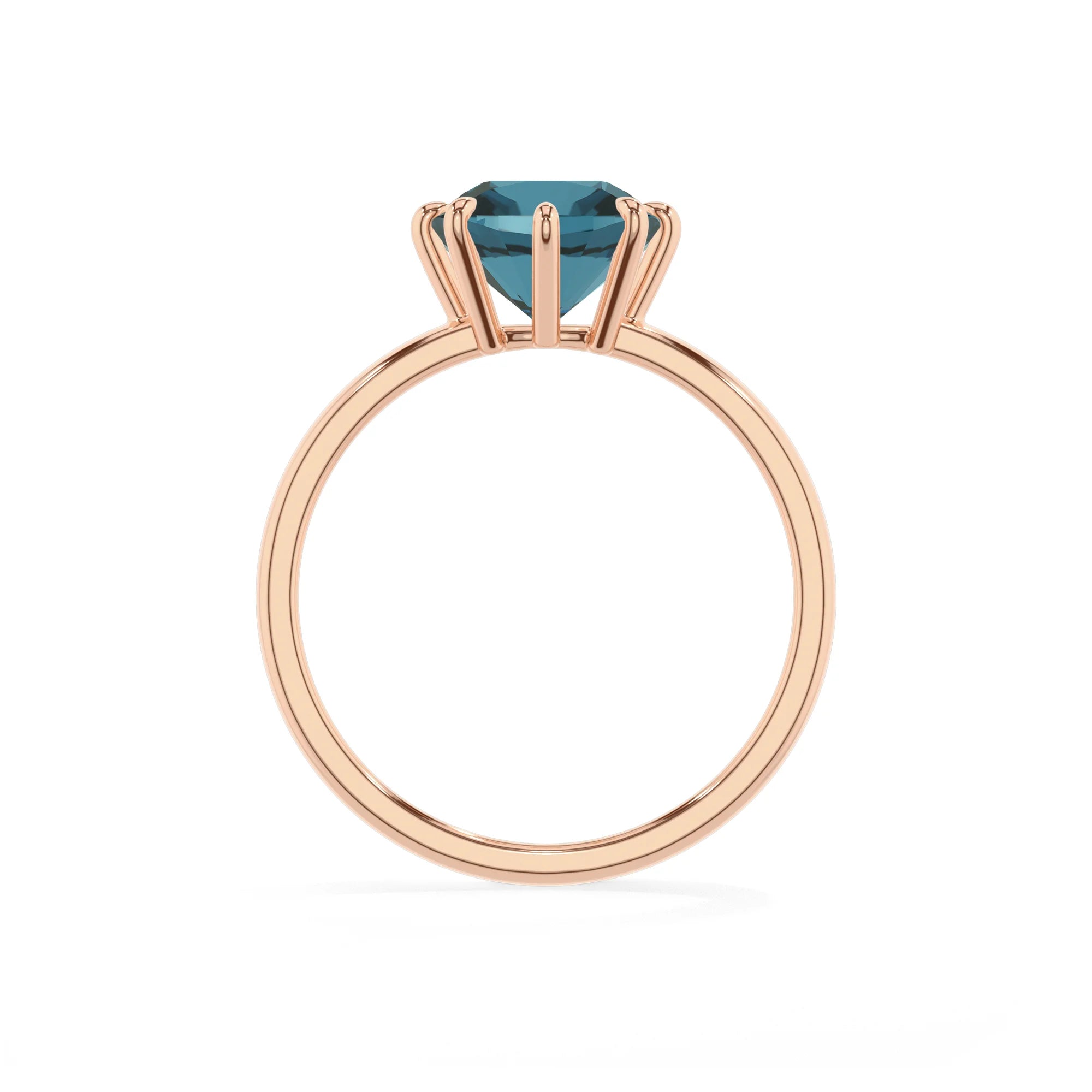 natural london-blue-topaz cushion solitaire rings in rose gold