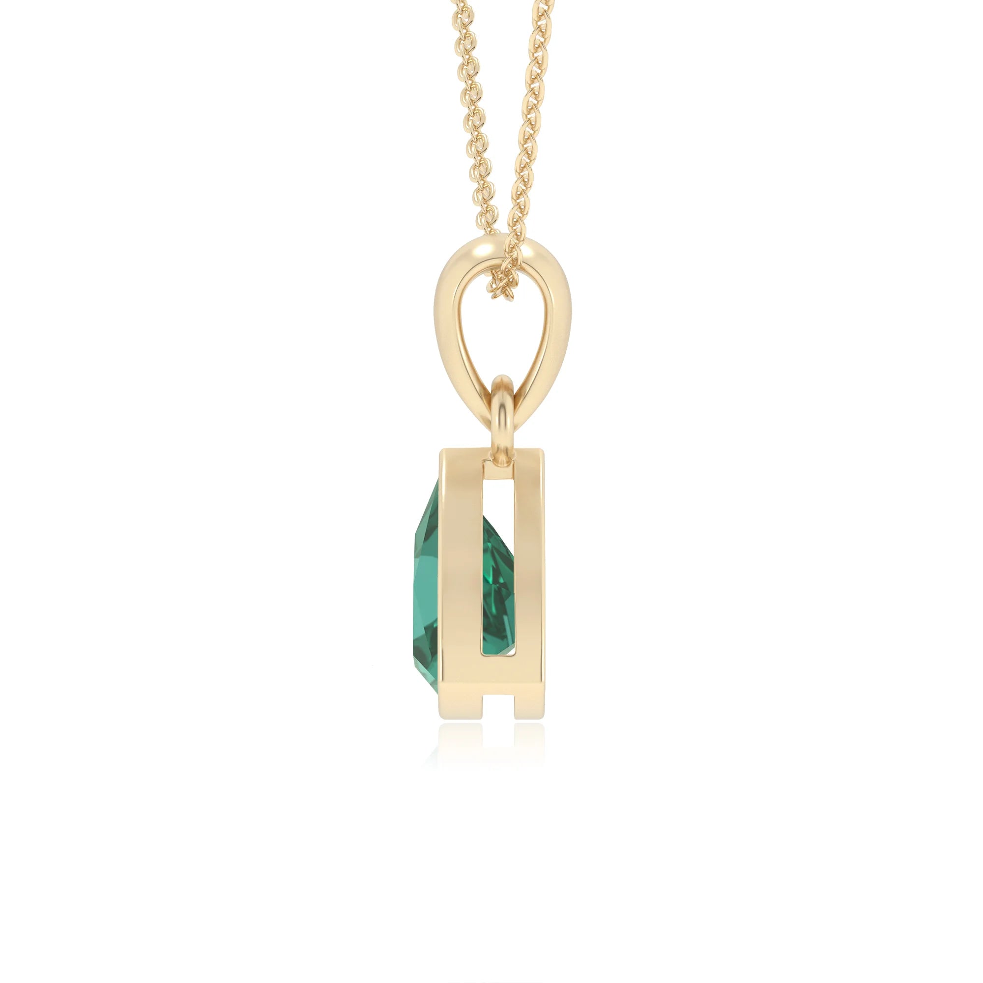 lab grown emerald trillion solitaire necklaces in yellow gold