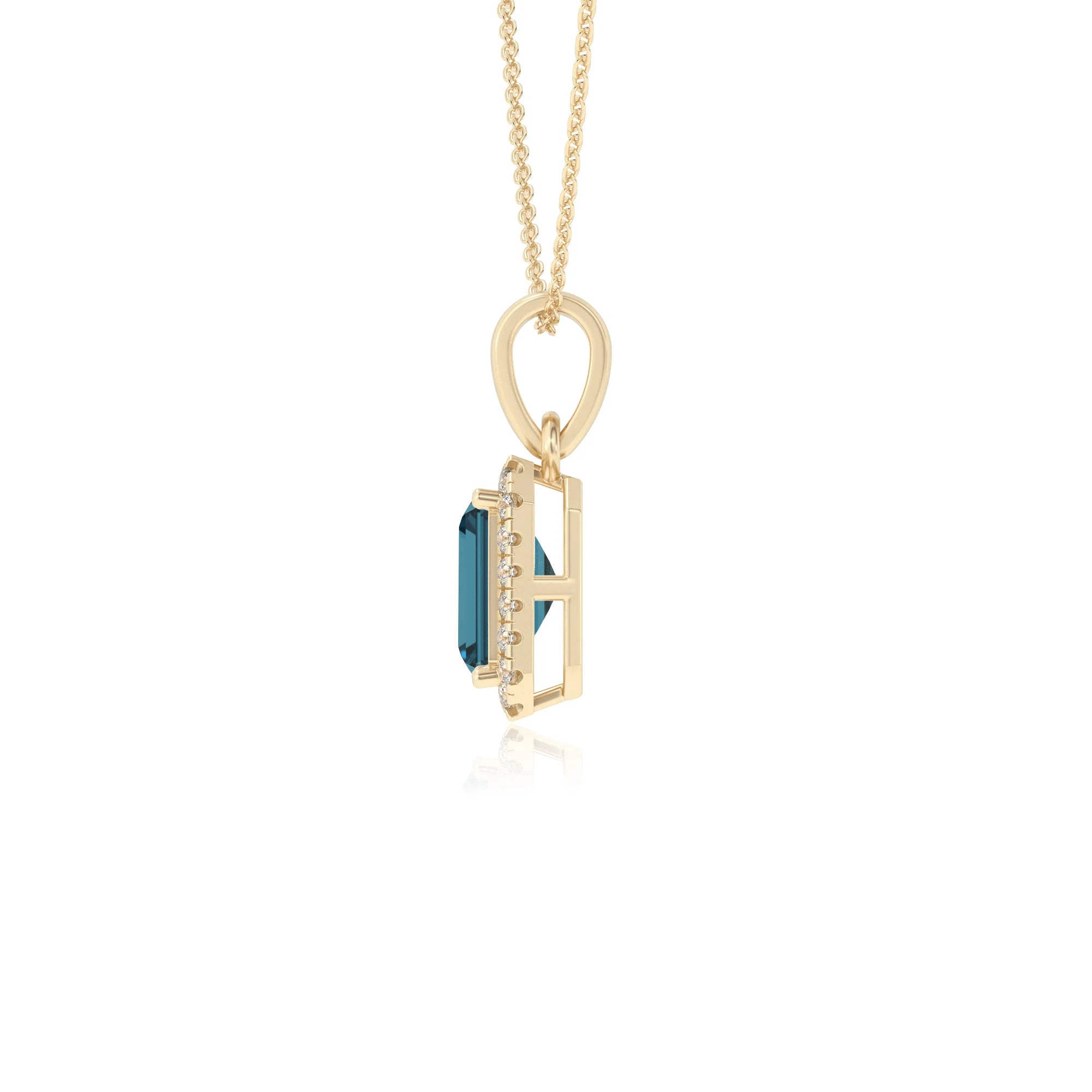natural london-blue-topaz emerald cut solitaire necklaces in yellow gold