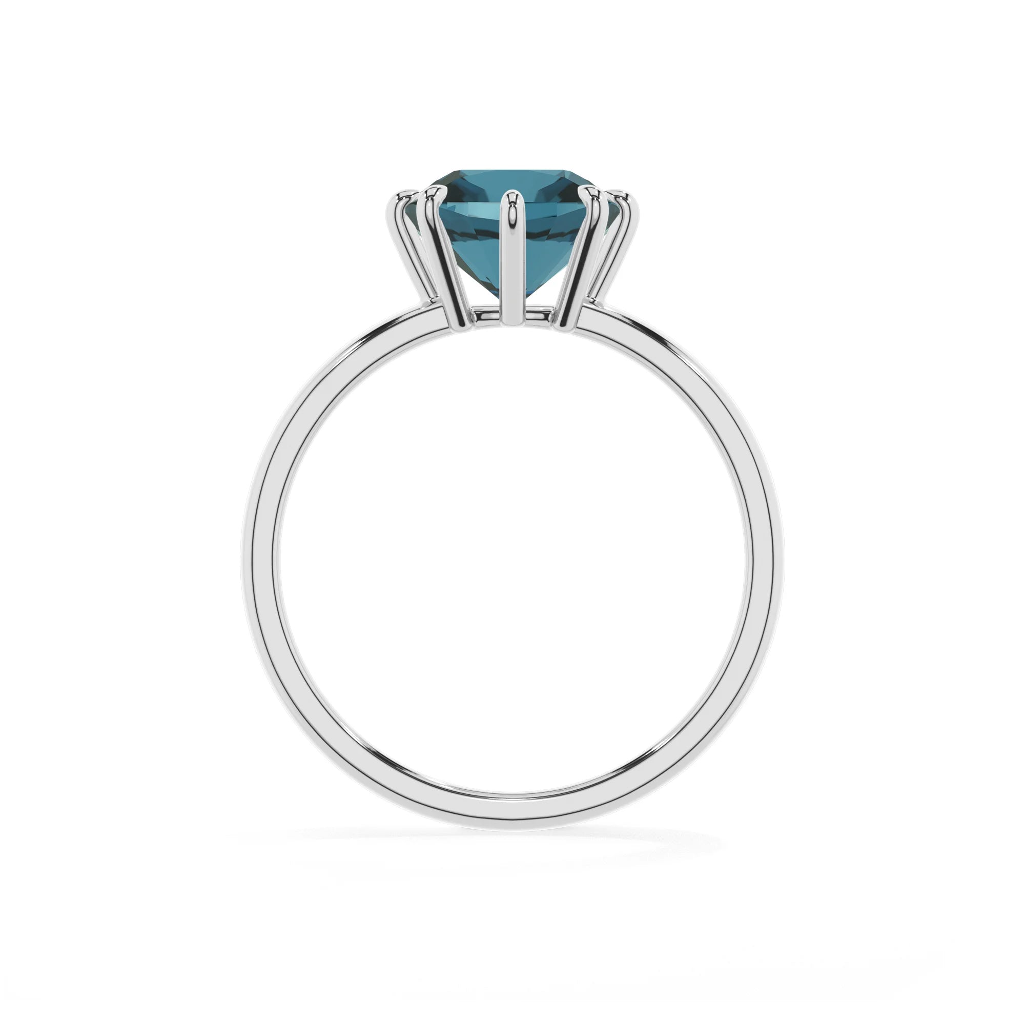 natural london-blue-topaz cushion solitaire rings in platinum