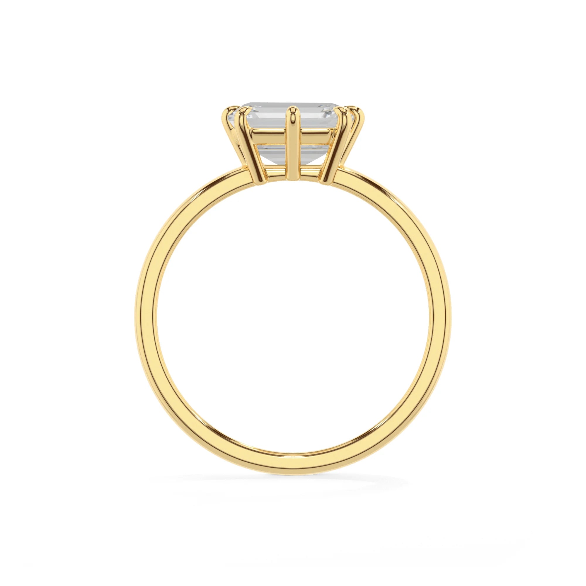 lab grown moissanite emerald cut solitaire rings in yellow gold