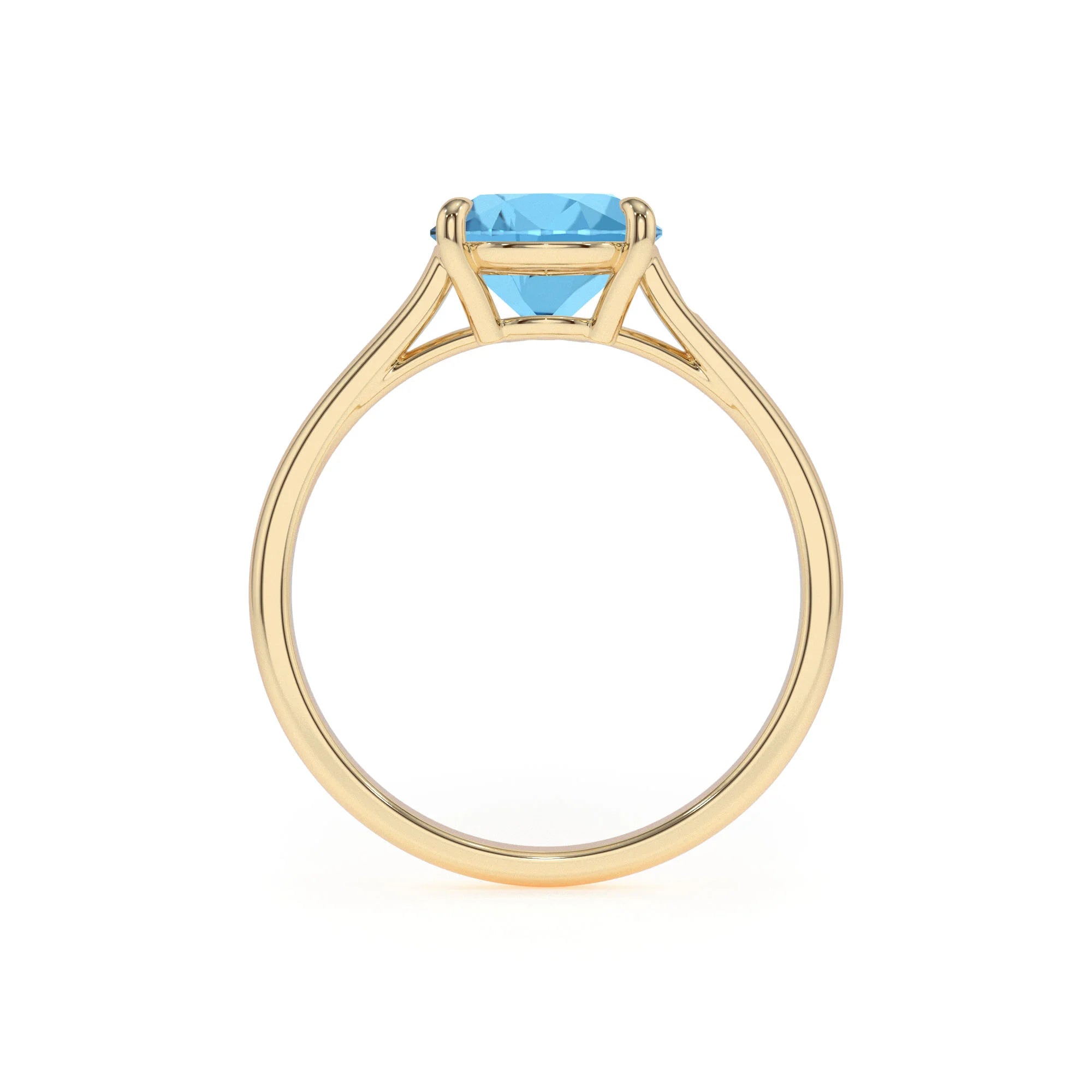 natural swiss-blue-topaz cushion solitaire rings in yellow gold