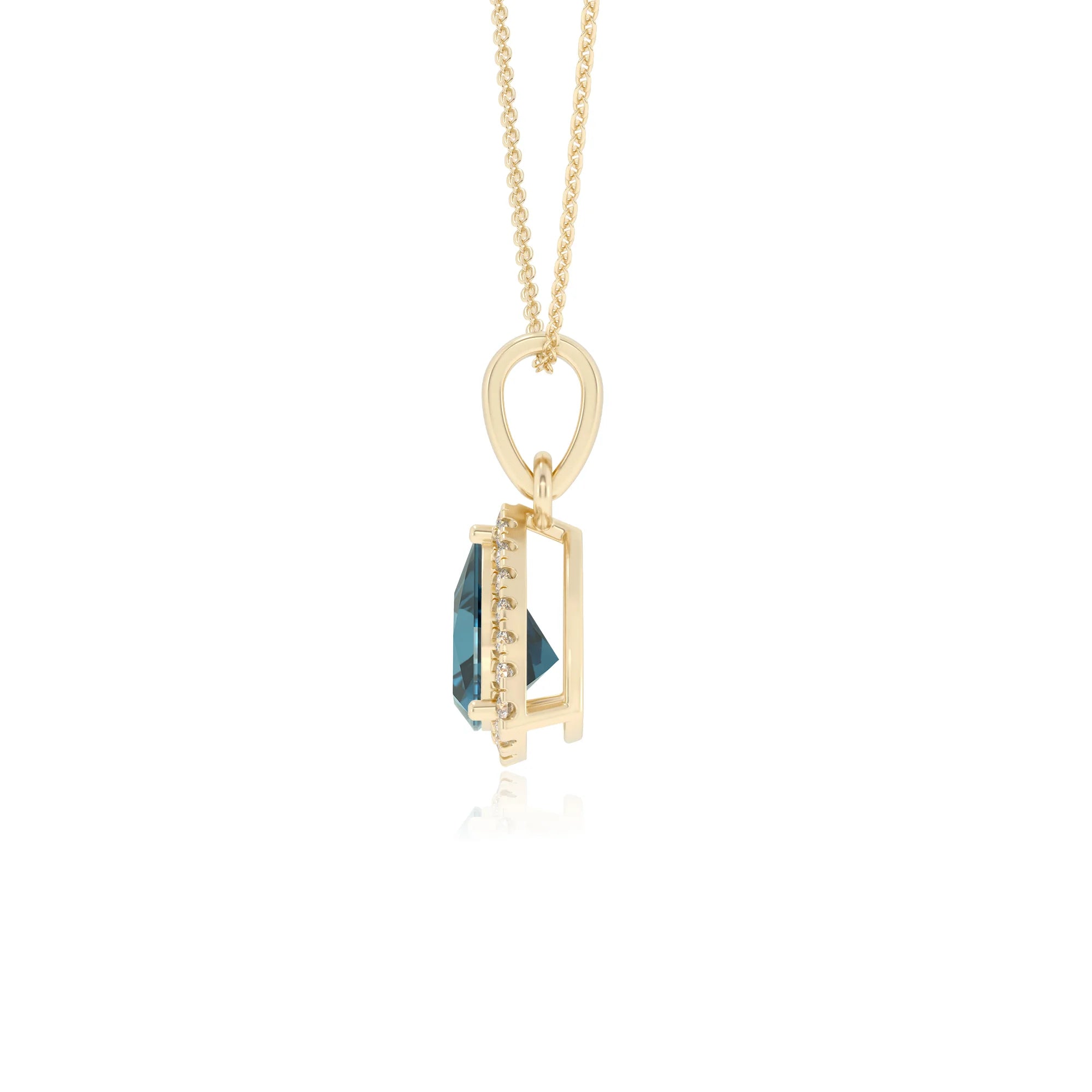 natural london-blue-topaz trillion solitaire necklaces in yellow gold