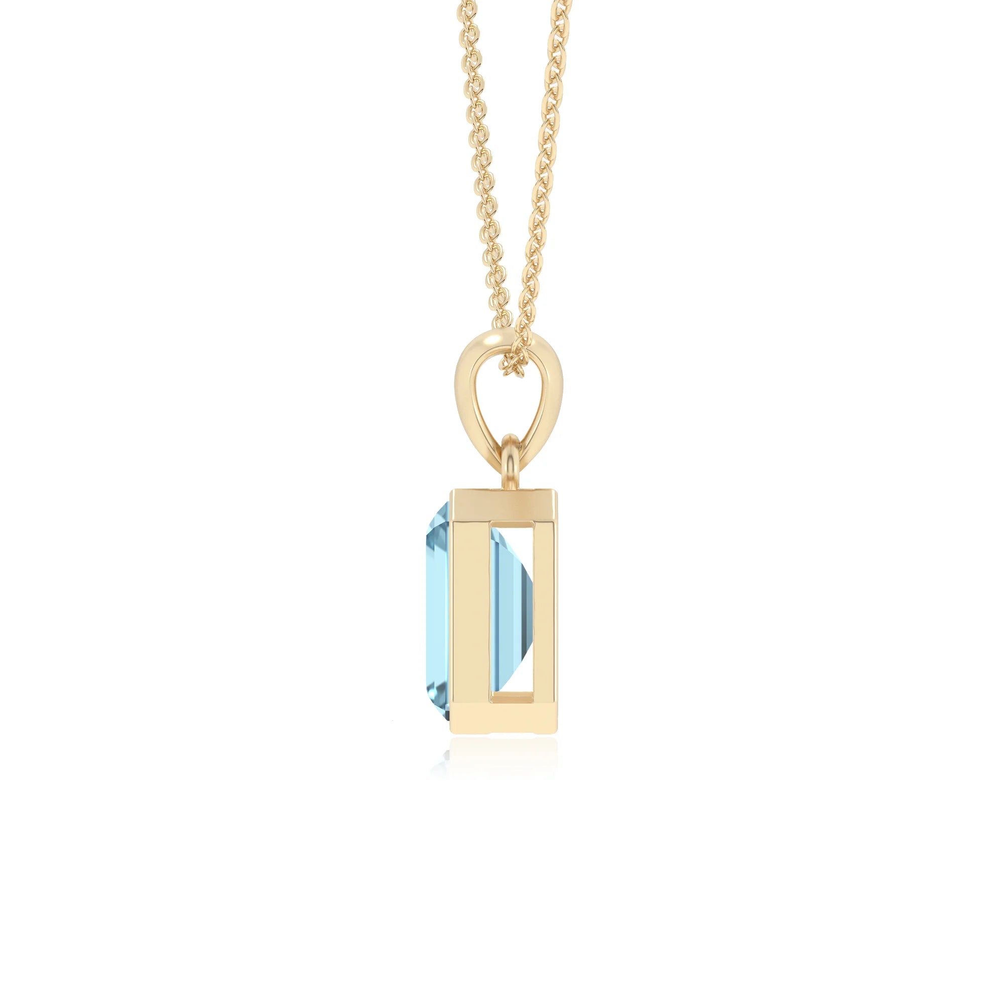 lab grown aquamarine emerald cut solitaire necklaces in yellow gold