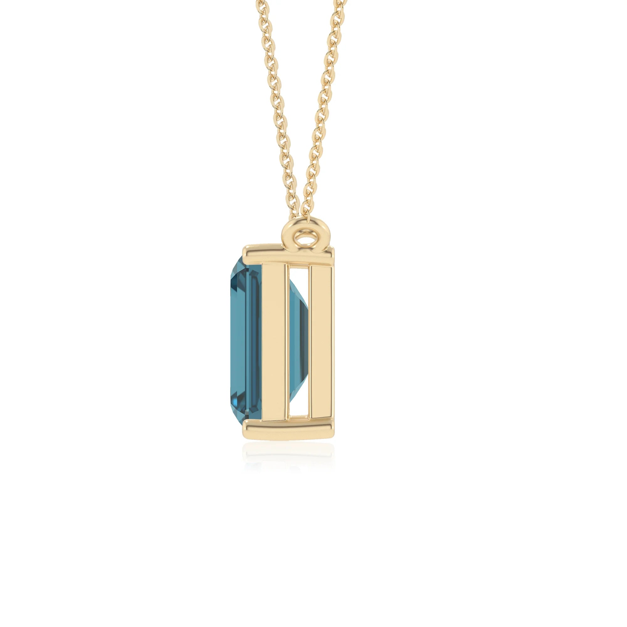 natural london-blue-topaz emerald cut solitaire necklaces in yellow gold