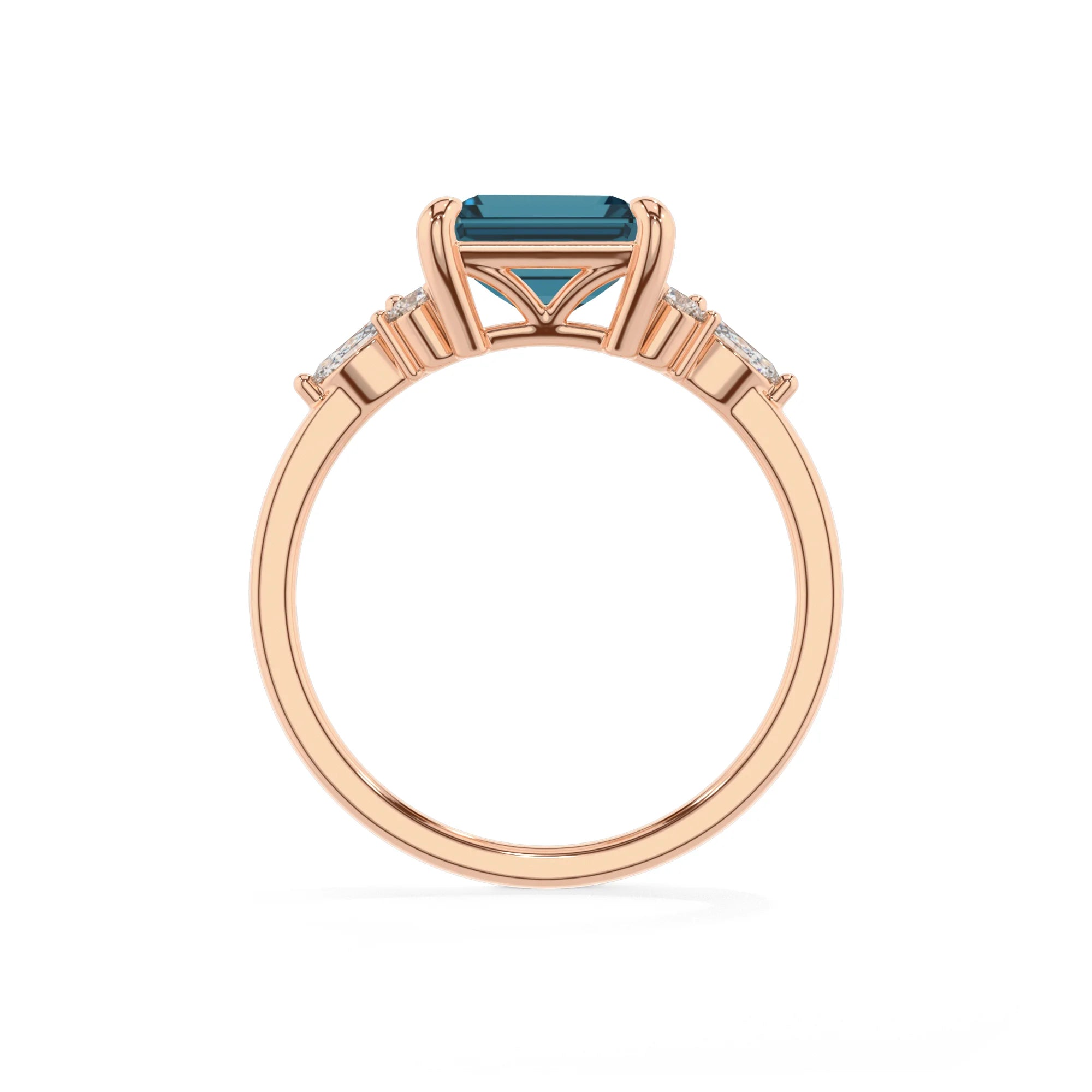 natural london-blue-topaz emerald cut solitaire rings in rose gold