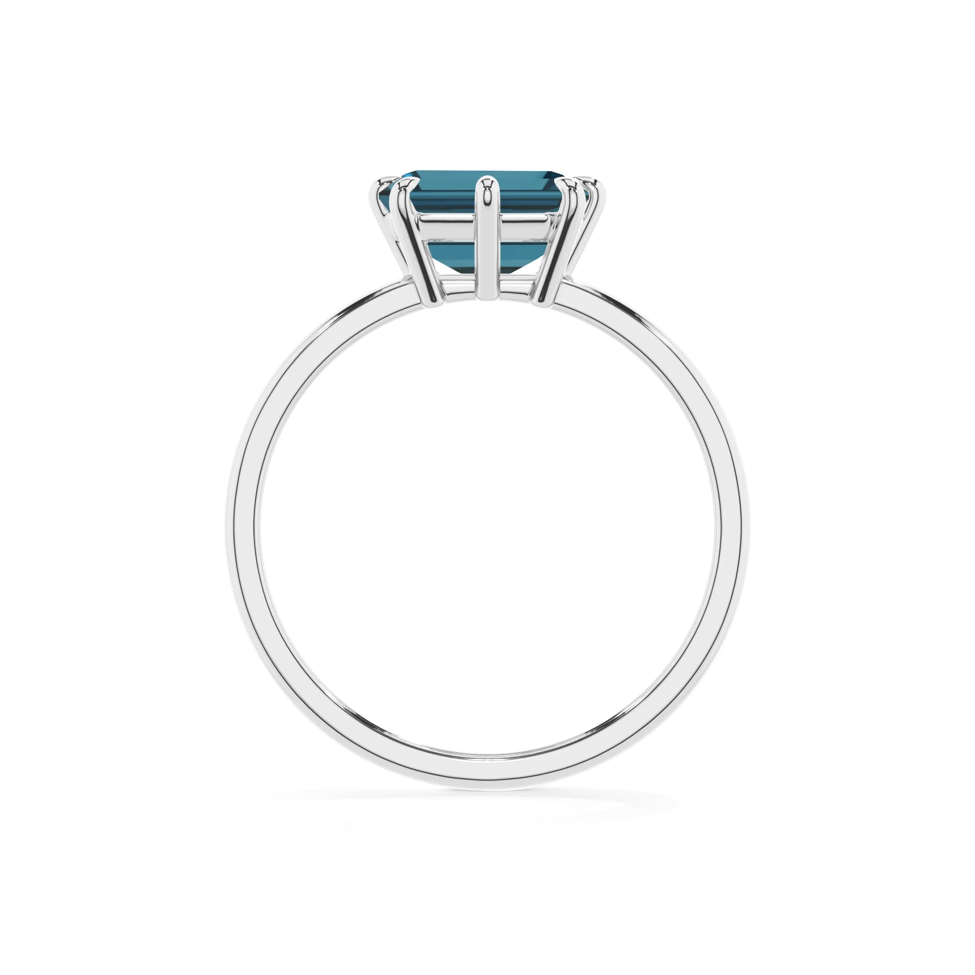 natural london-blue-topaz emerald cut solitaire rings in platinum