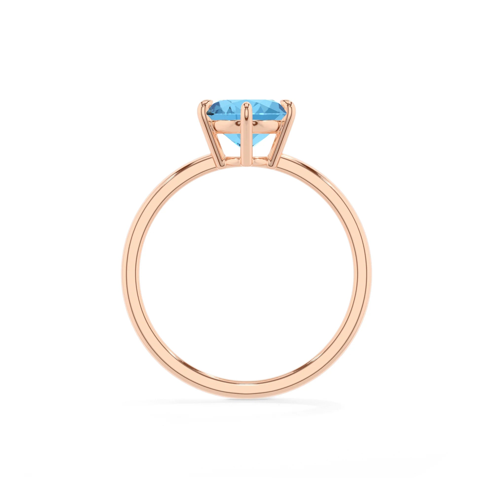 natural swiss-blue-topaz oval solitaire rings in rose gold