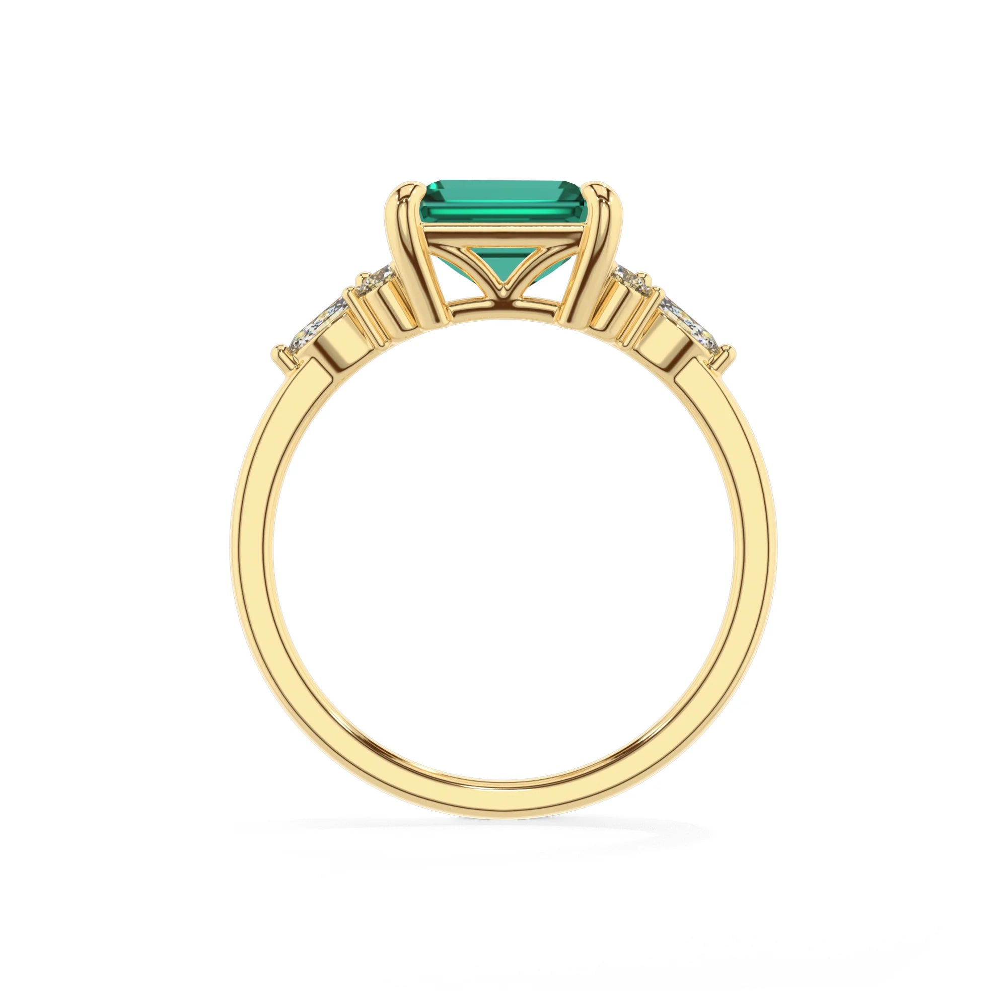 lab grown emerald octogon cut solitaire rings in yellow gold