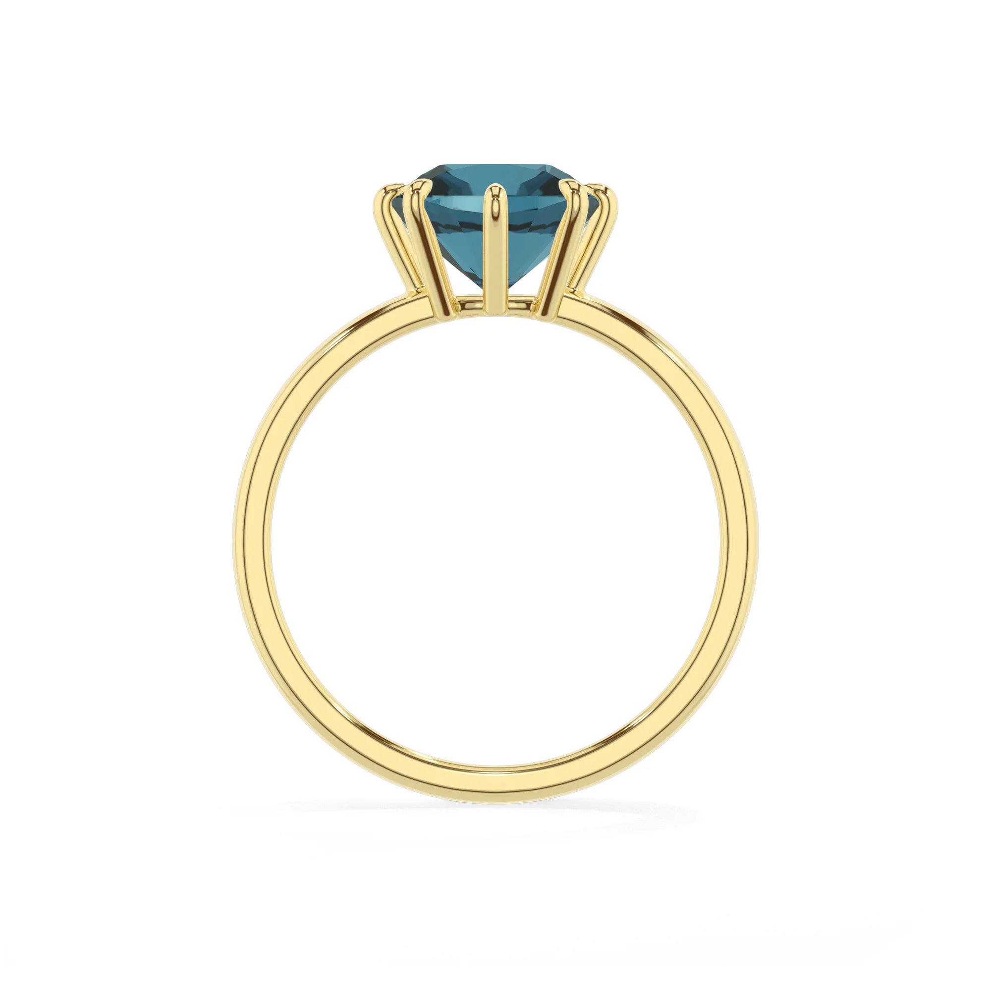 natural london-blue-topaz cushion solitaire rings in yellow gold