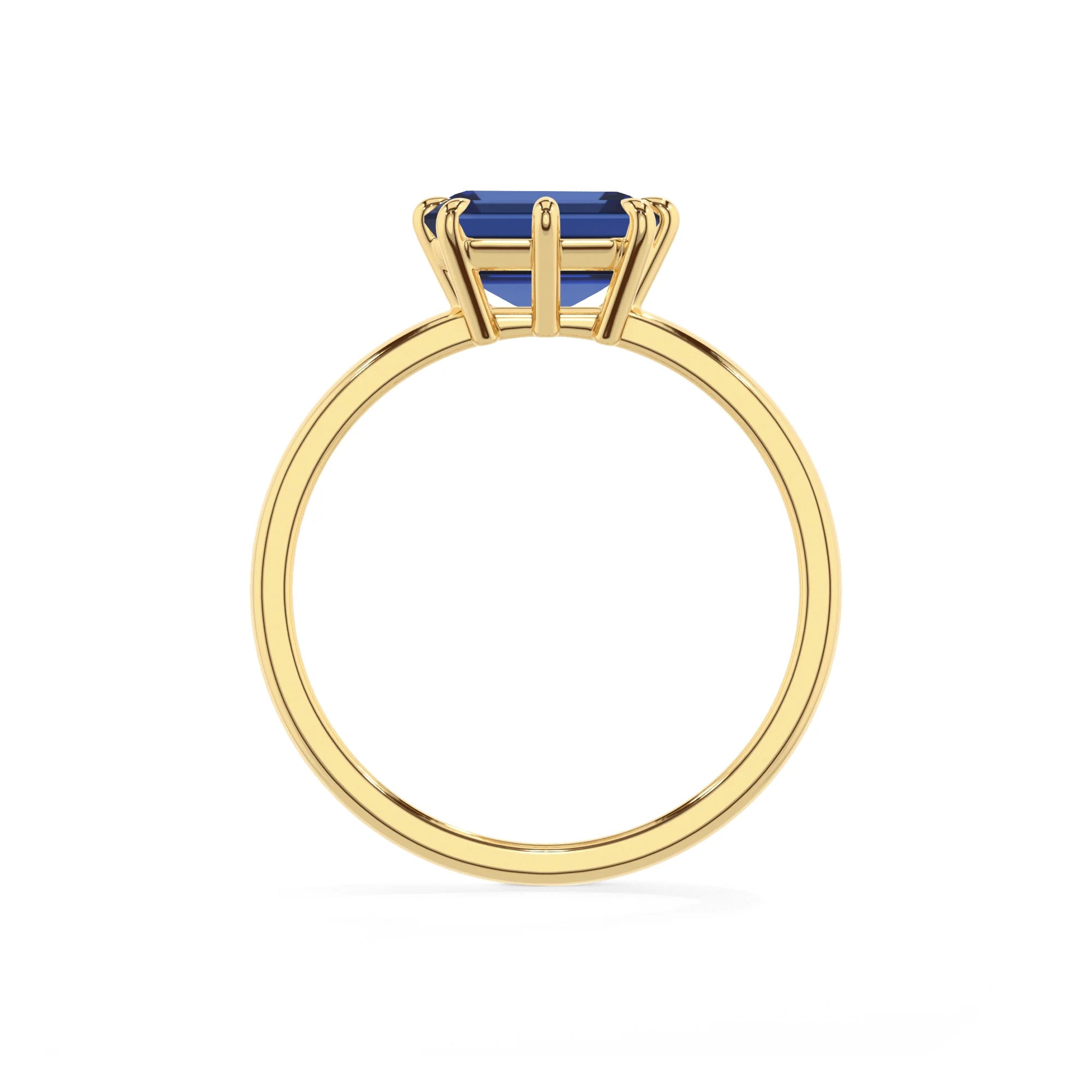 lab grown blue-sapphire emerald cut solitaire rings in yellow gold