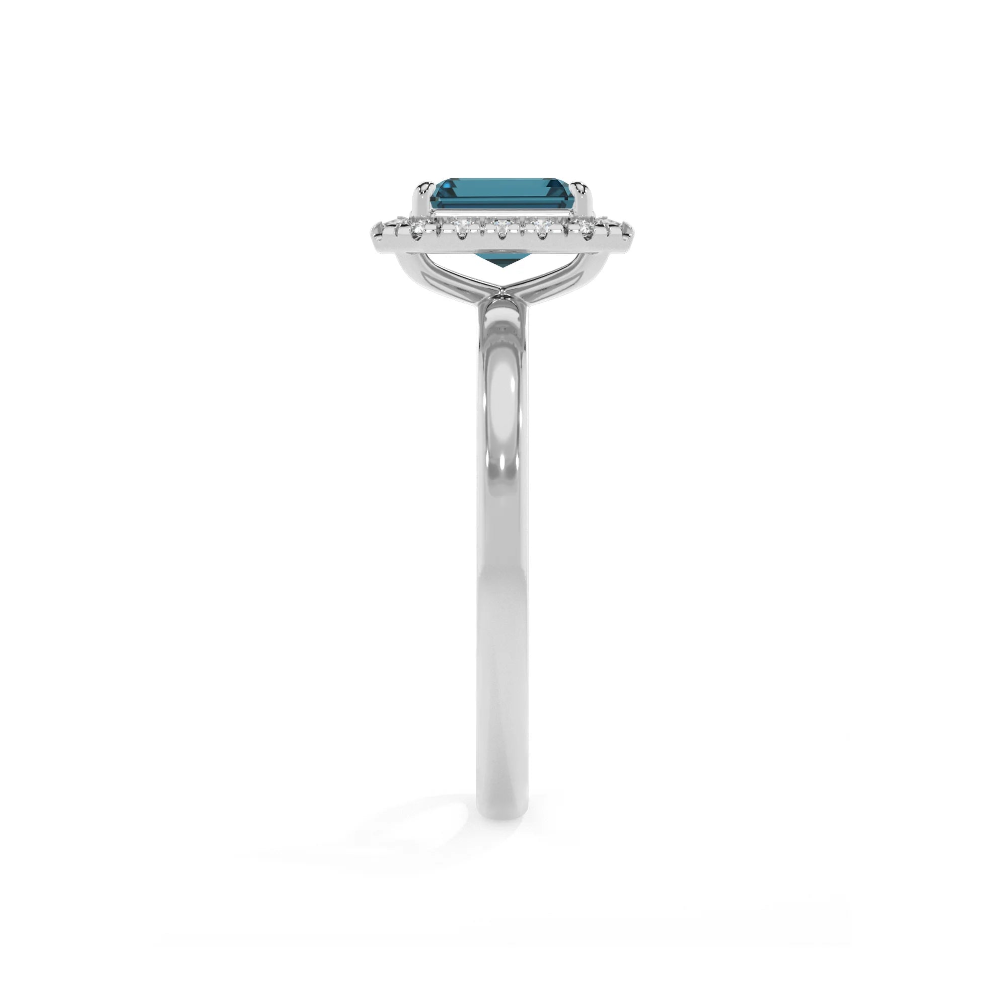 natural london-blue-topaz emerald cut solitaire rings in platinum