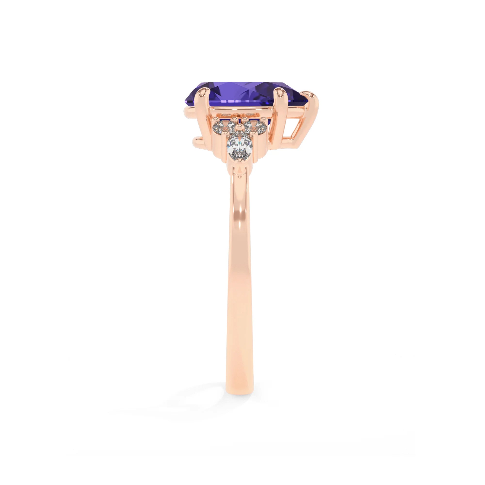 lab grown tanzanite pear solitaire rings in rose gold