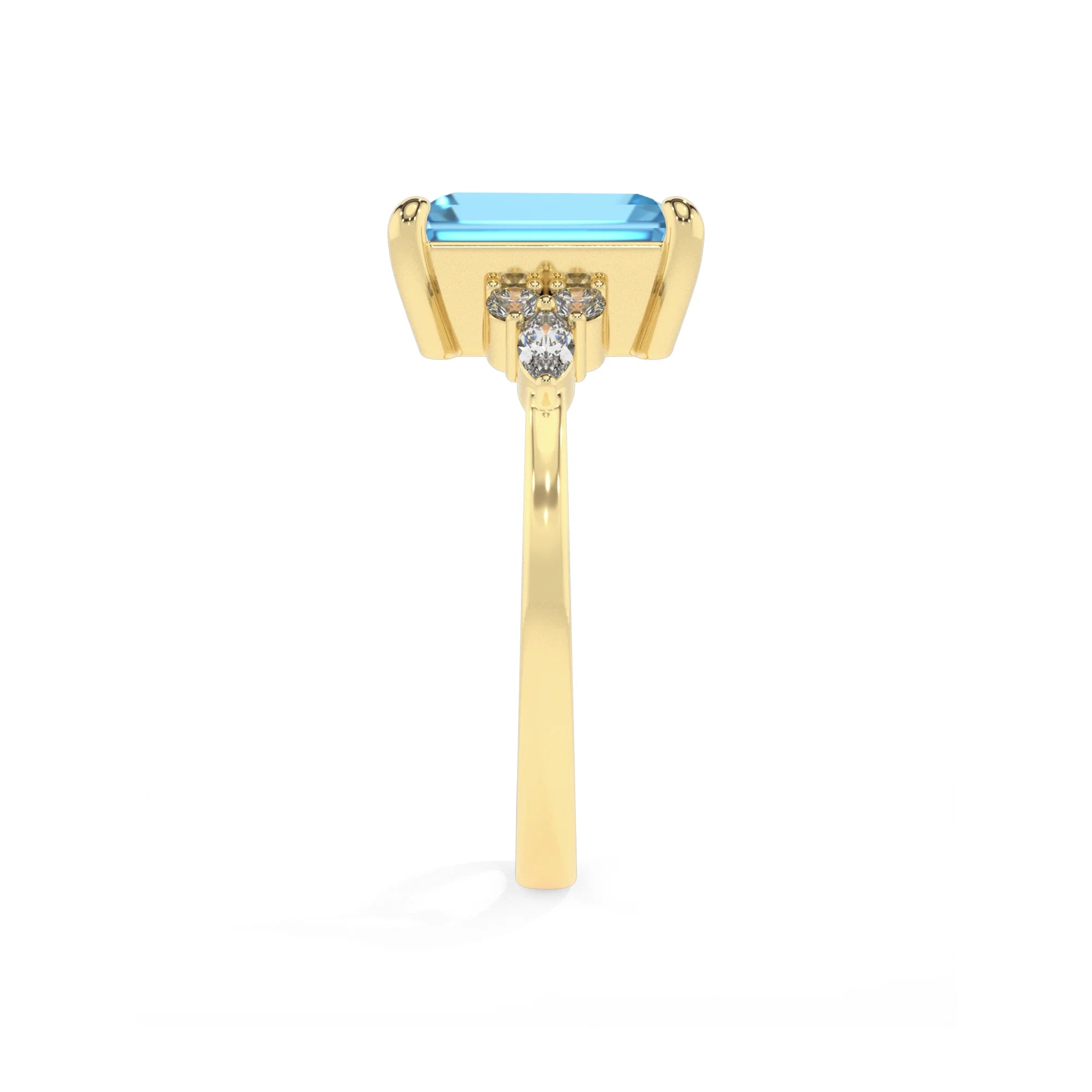 natural swiss-blue-topaz emerald cut solitaire rings in yellow gold