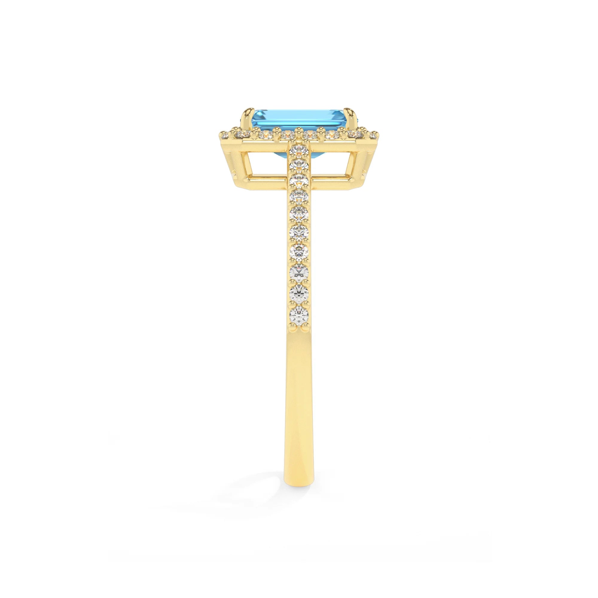 natural swiss-blue-topaz emerald cut solitaire rings in yellow gold