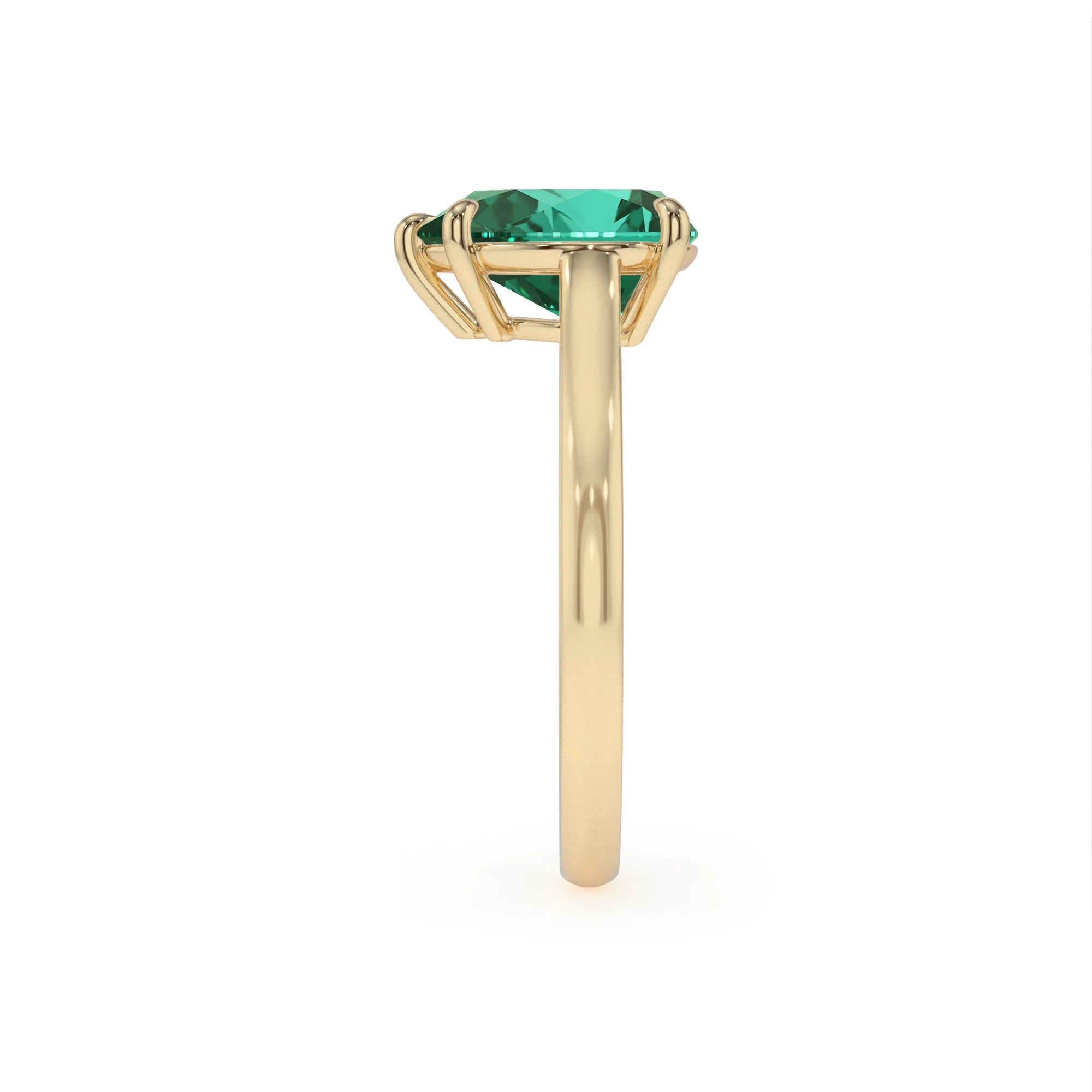 lab grown emerald pear solitaire rings in yellow gold