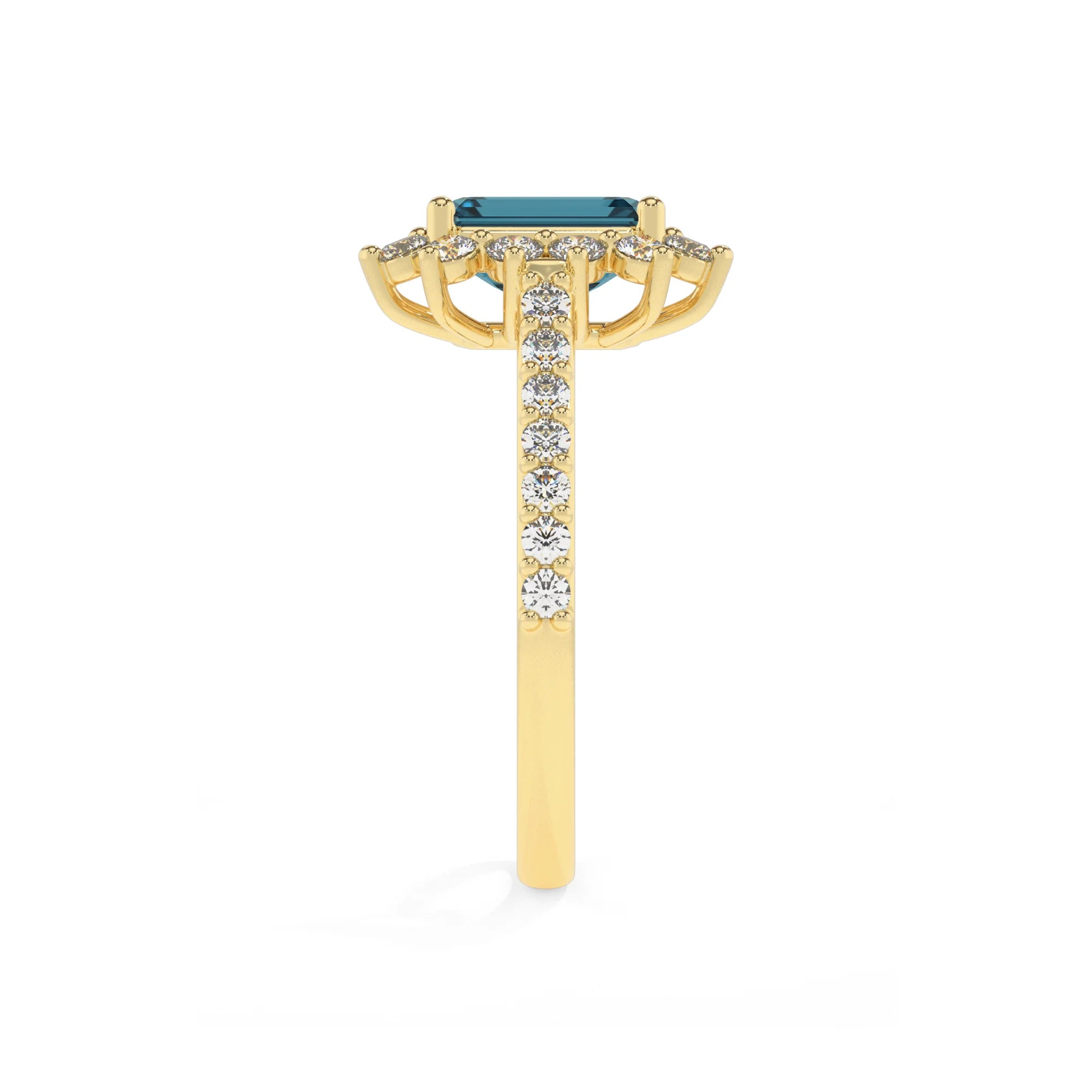 natural london-blue-topaz emerald cut solitaire rings in yellow gold