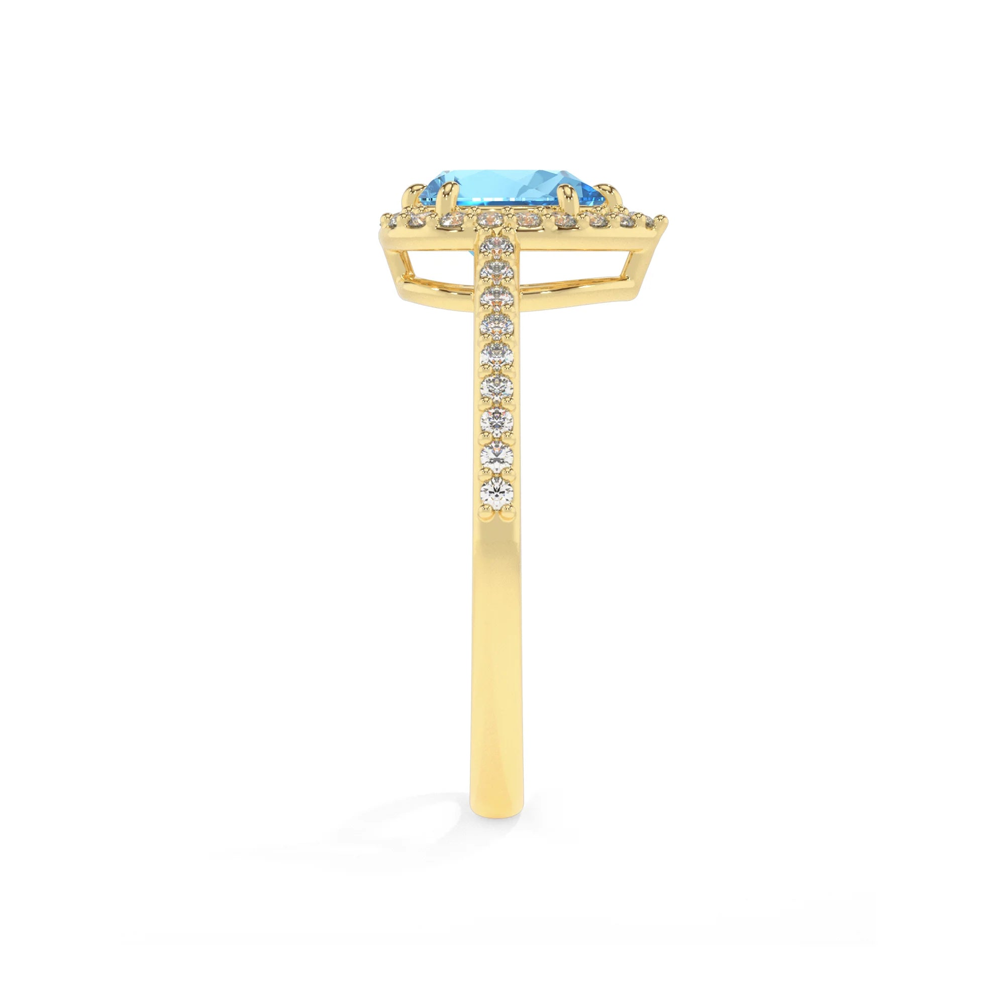 natural swiss-blue-topaz pear solitaire rings in yellow gold